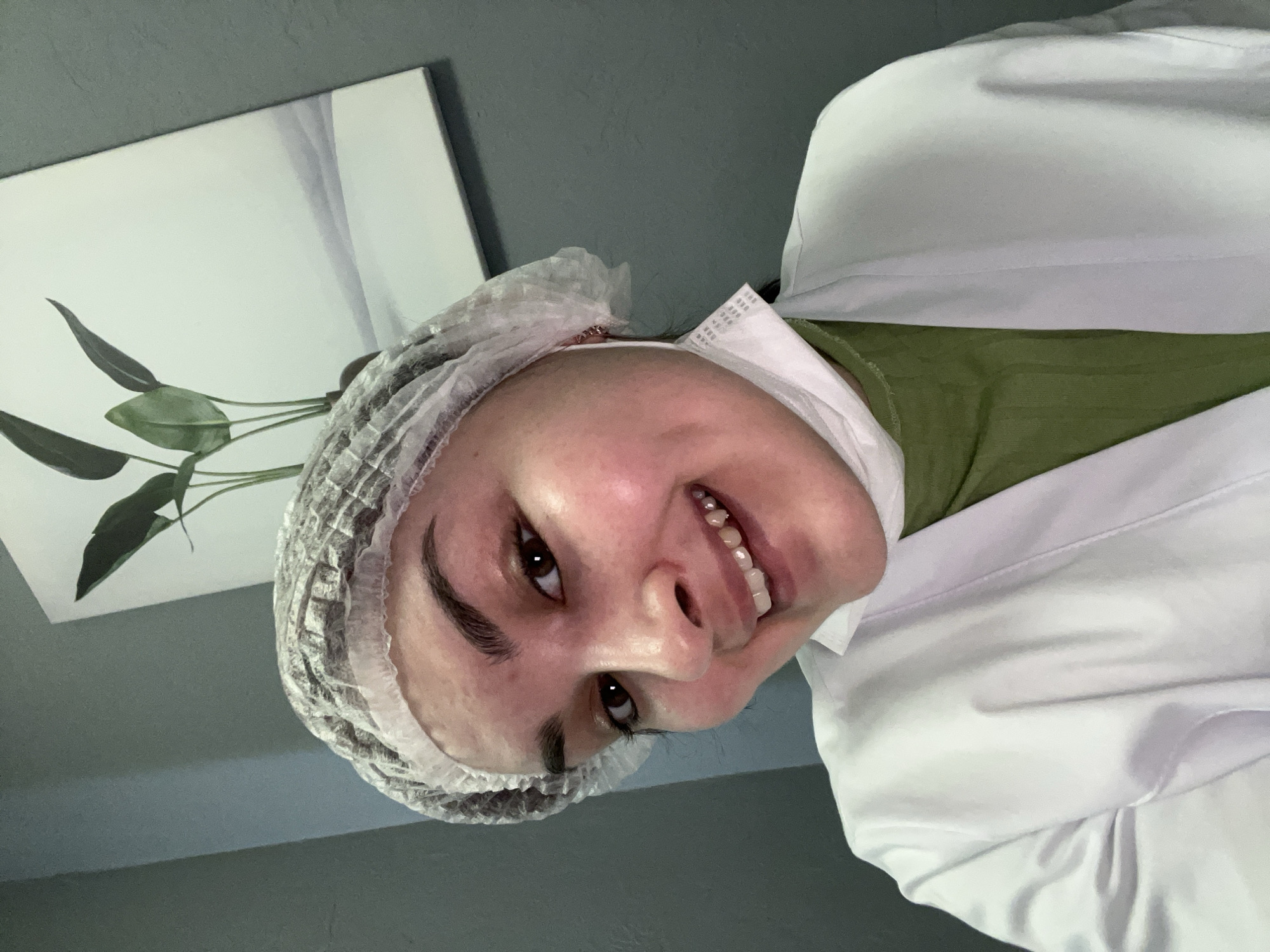 Healthcare worker takes selfies in medical attire in Russia