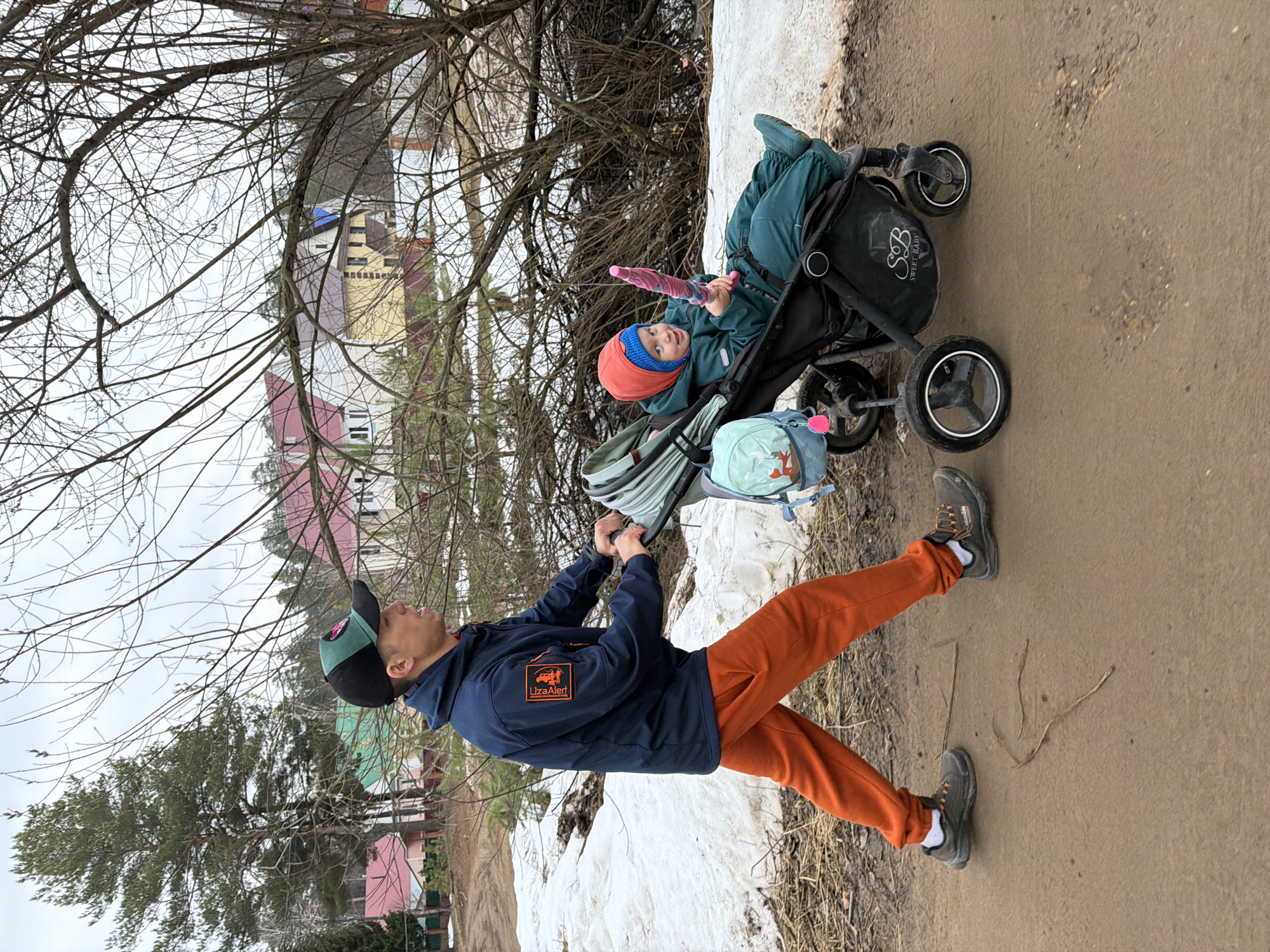 Family outing documented in Chaikovsky woods with selfies, stroller walks