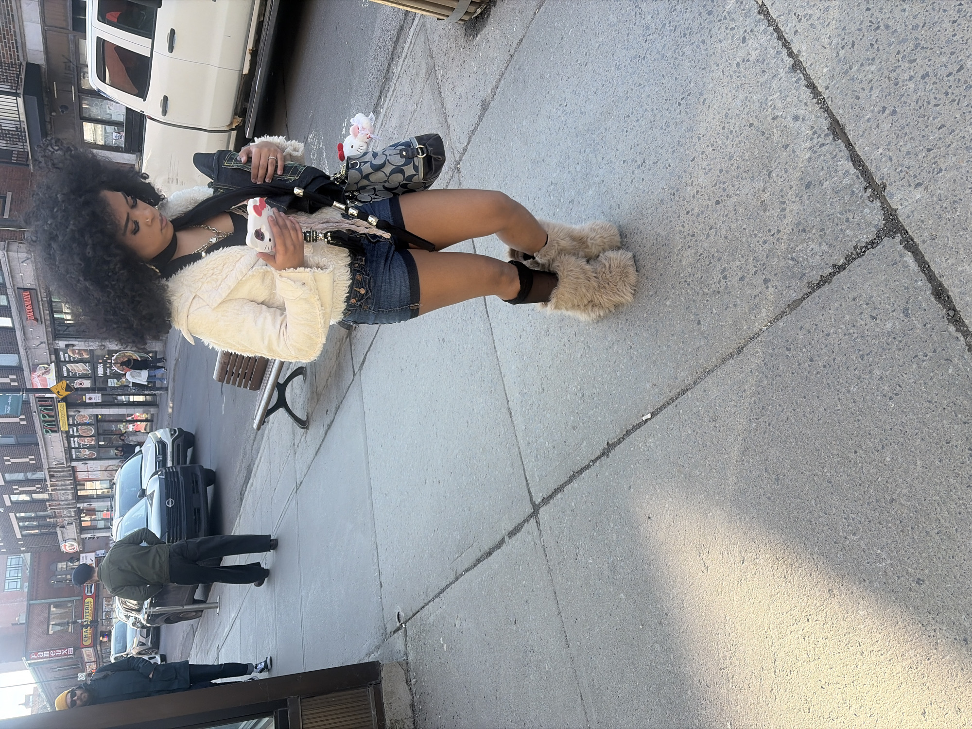 Woman with Hello Kitty phone spotted on Montreal sidewalk