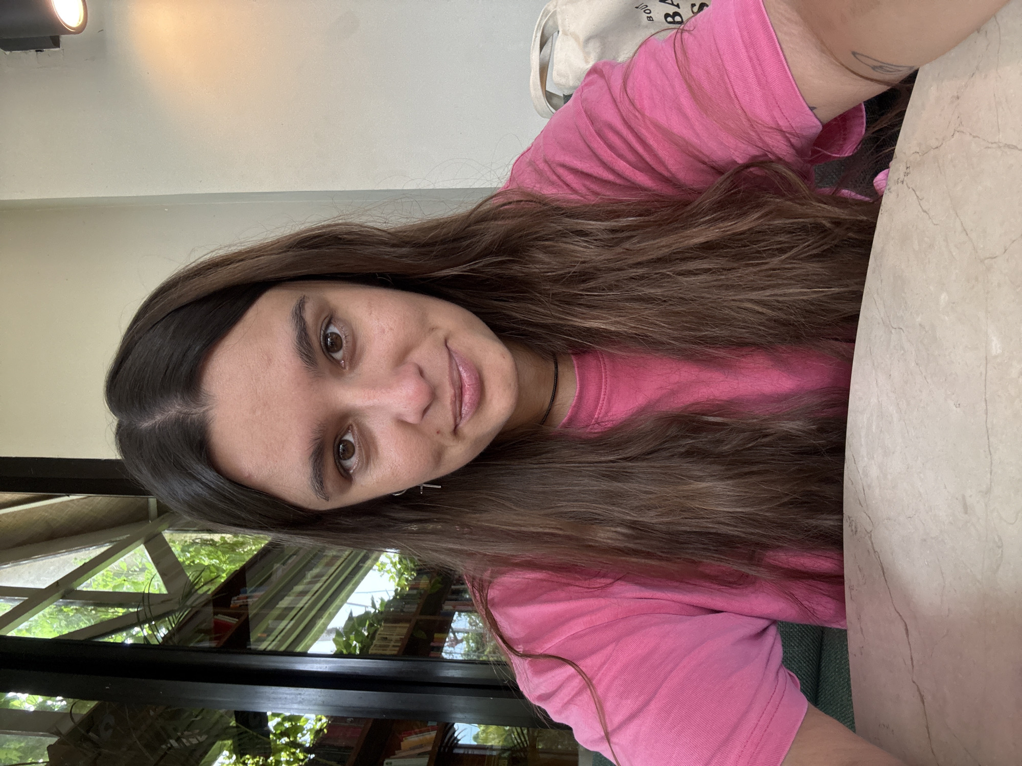Woman visits cafe-bookstore in Ubud, captures treats and books