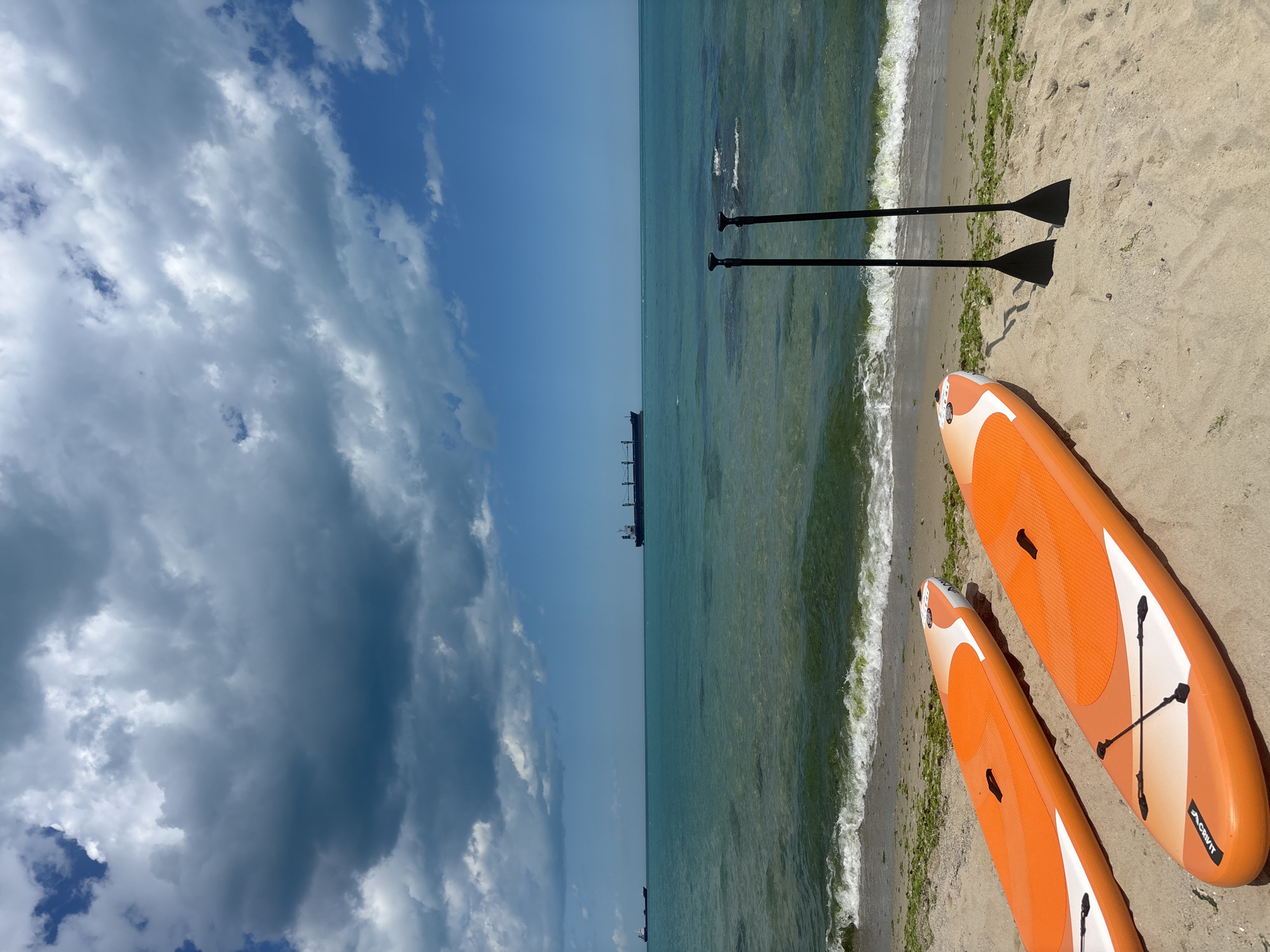 Paddleboard setup on Varna beach with turquoise sea backdrop