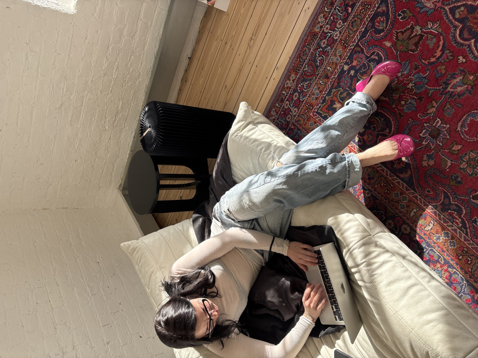 People documented in London studio space during morning hours