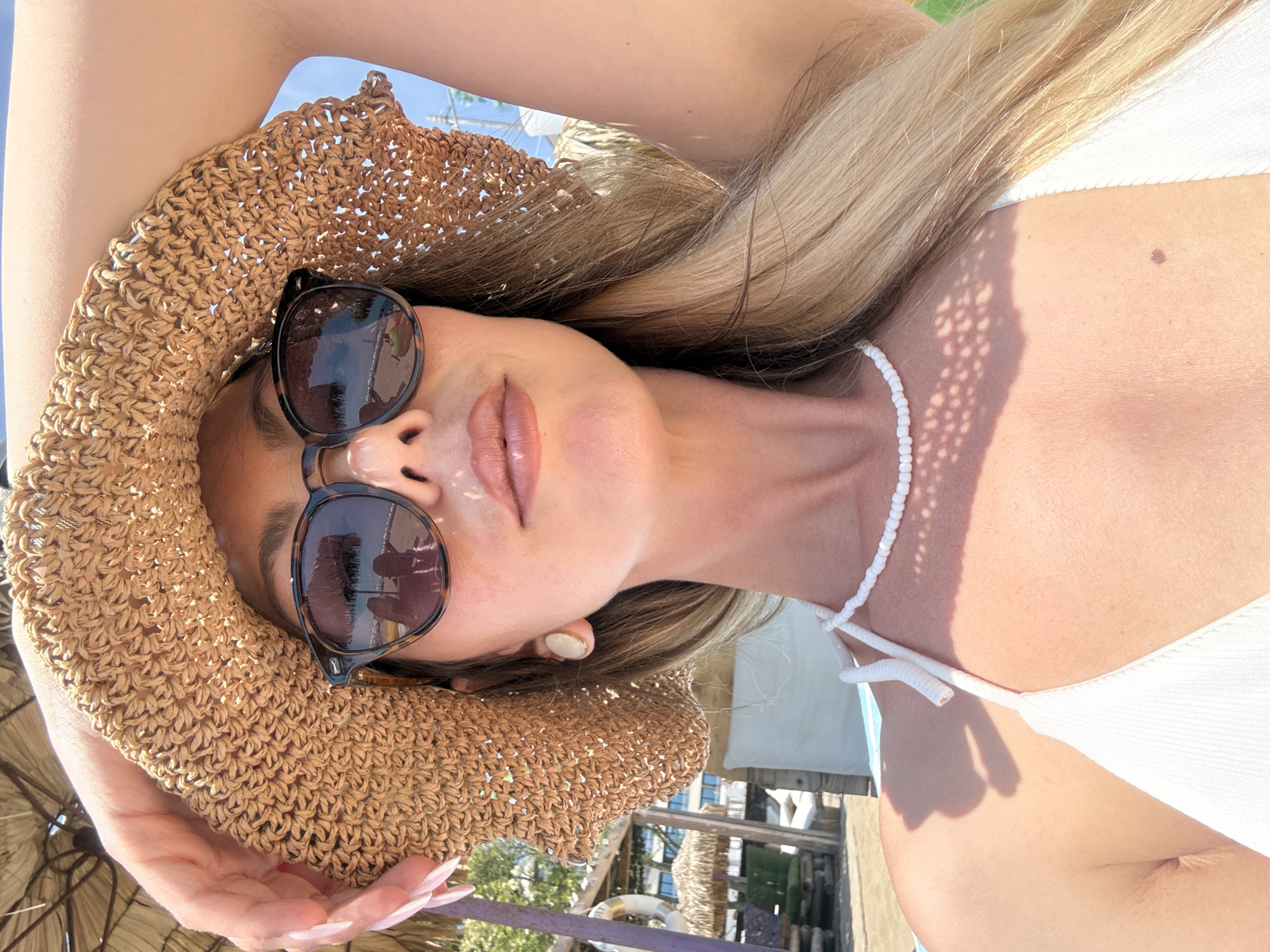 Tourist enjoys sunny morning beach visit in Nesebar, Bulgaria