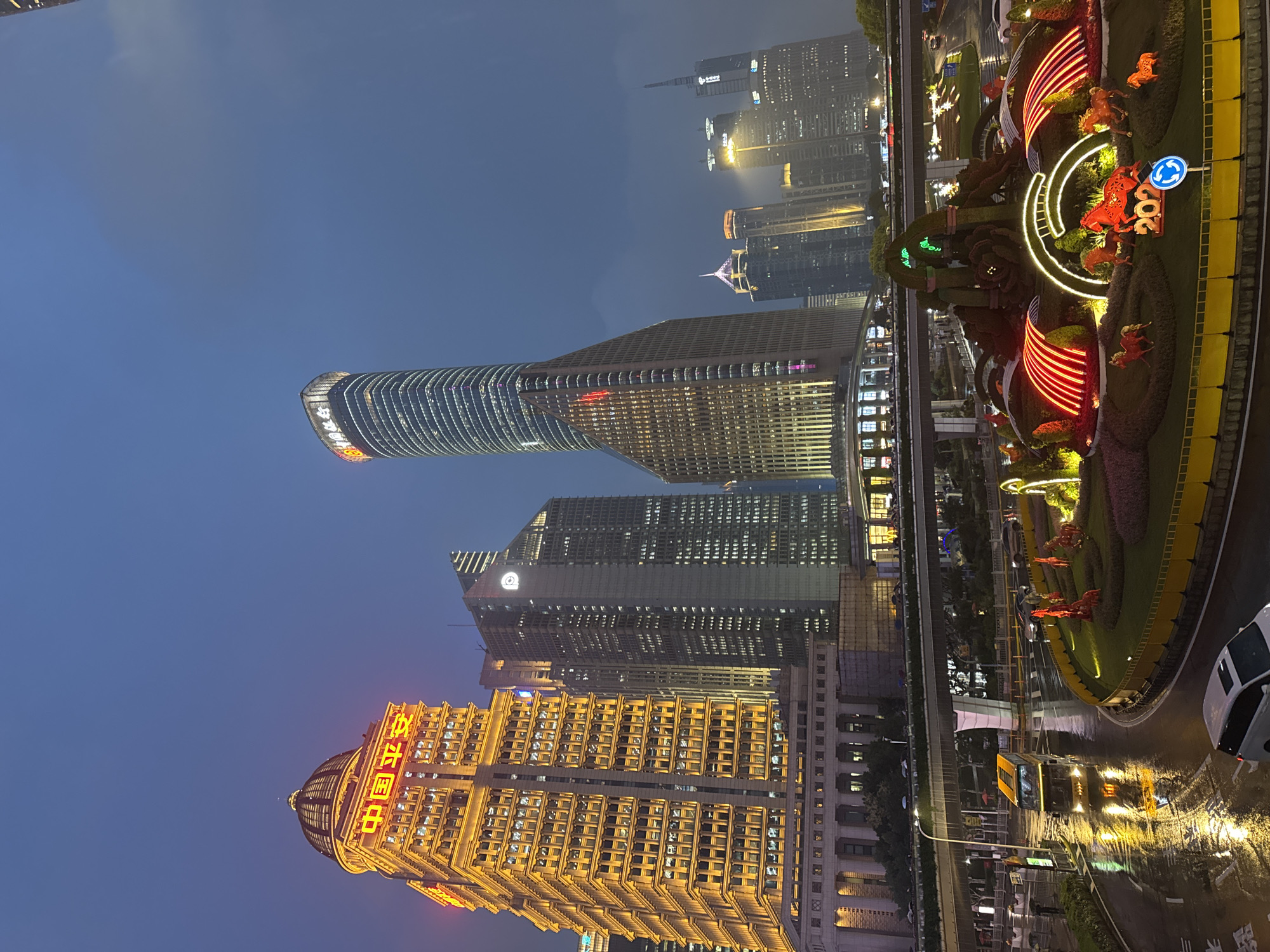 Pudong skyline at dusk and night, Oriental Pearl Tower glowing