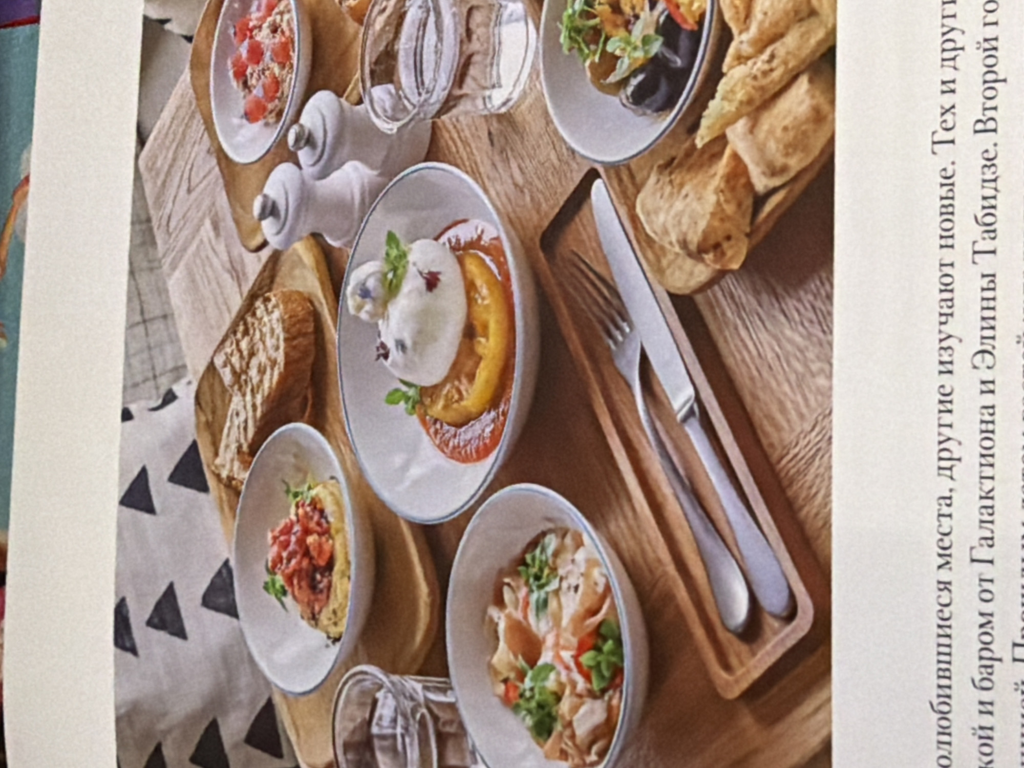Evening dining captured at Moscow TSUM rooftop restaurant terrace