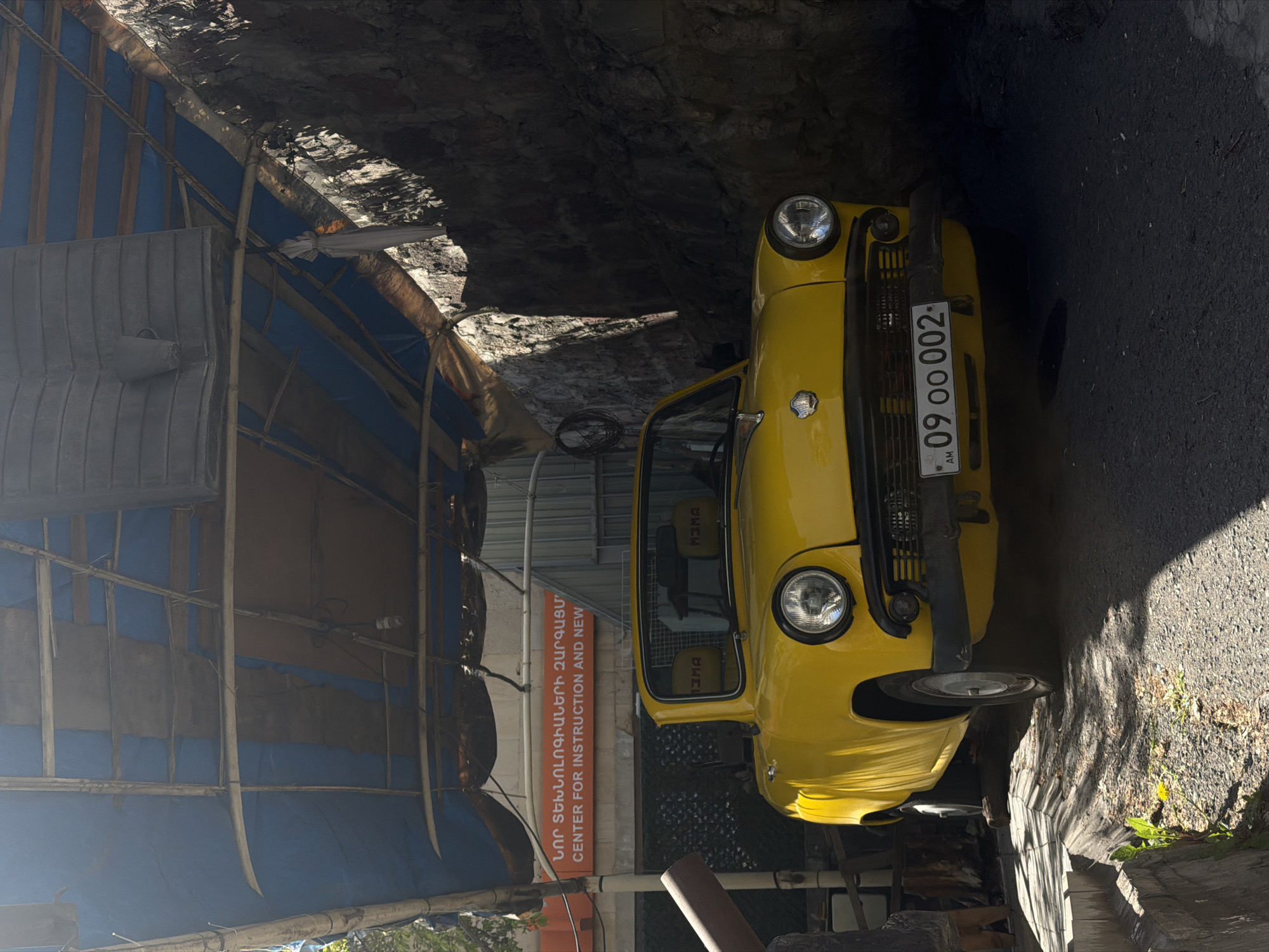 Yellow vintage car spotted parked in Yerevan