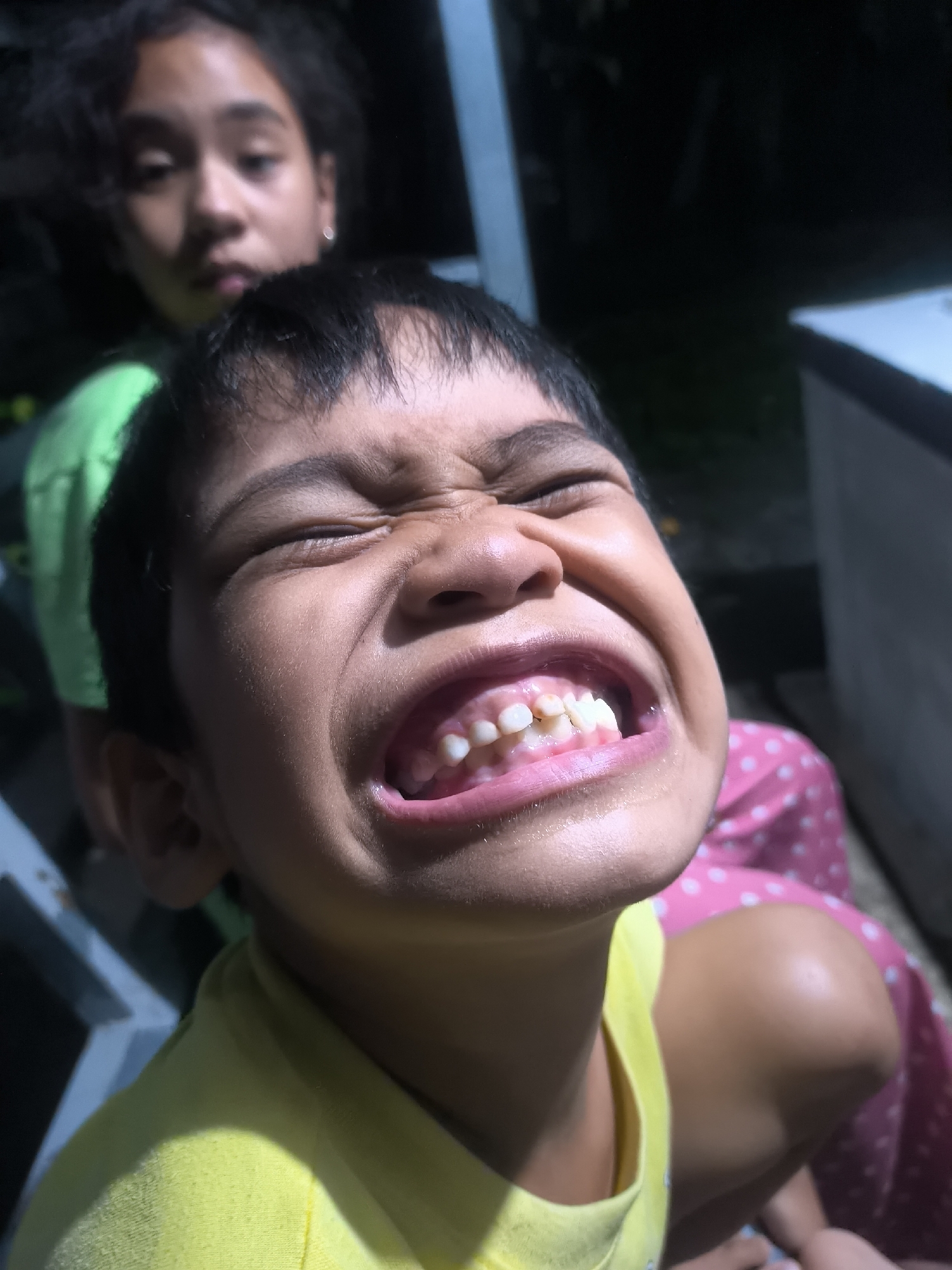 Daily life moments captured: children playing, nighttime repairs