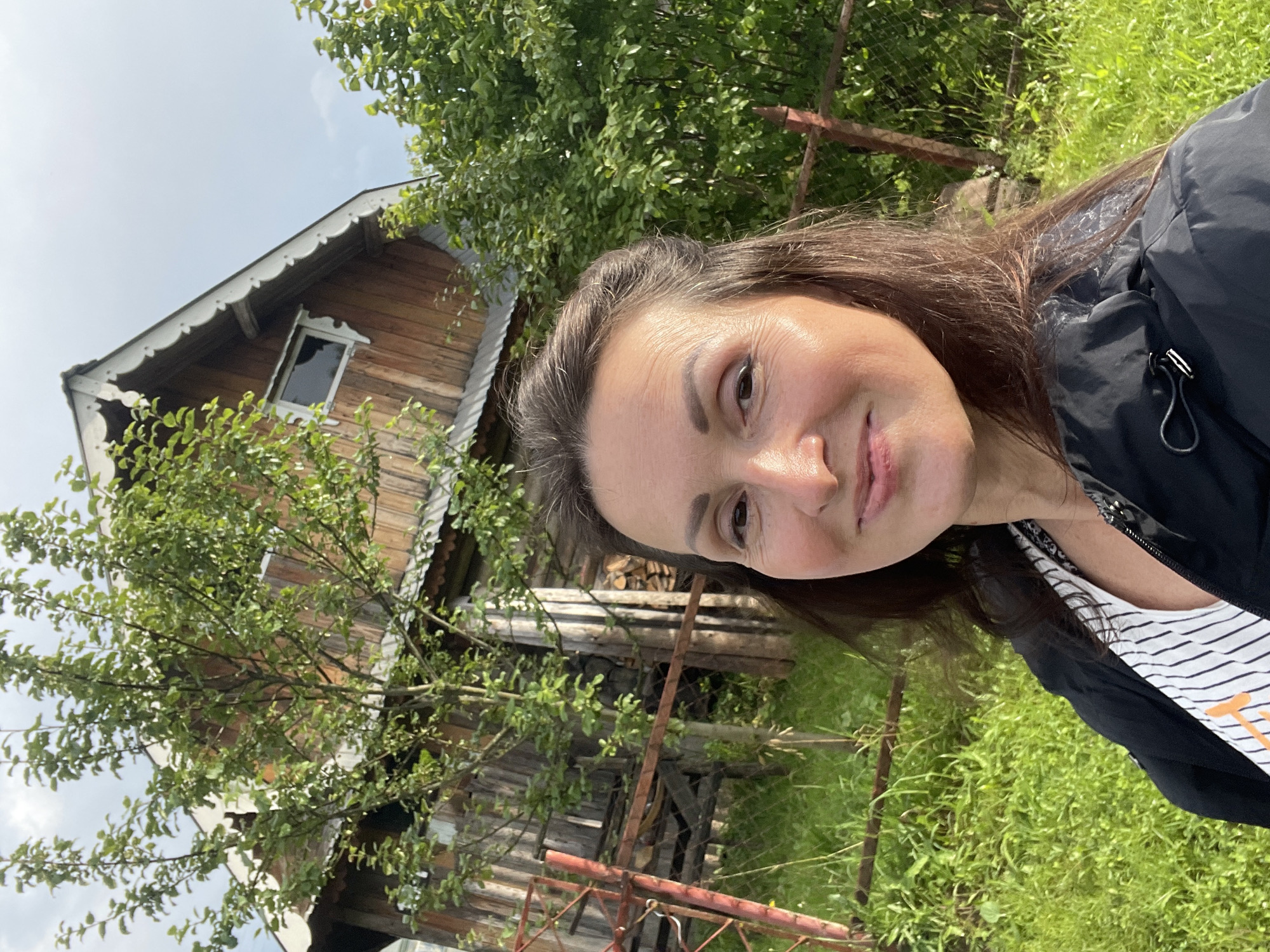 Lazy summer day in a Russian village: cats, wildflowers, and dirt roads