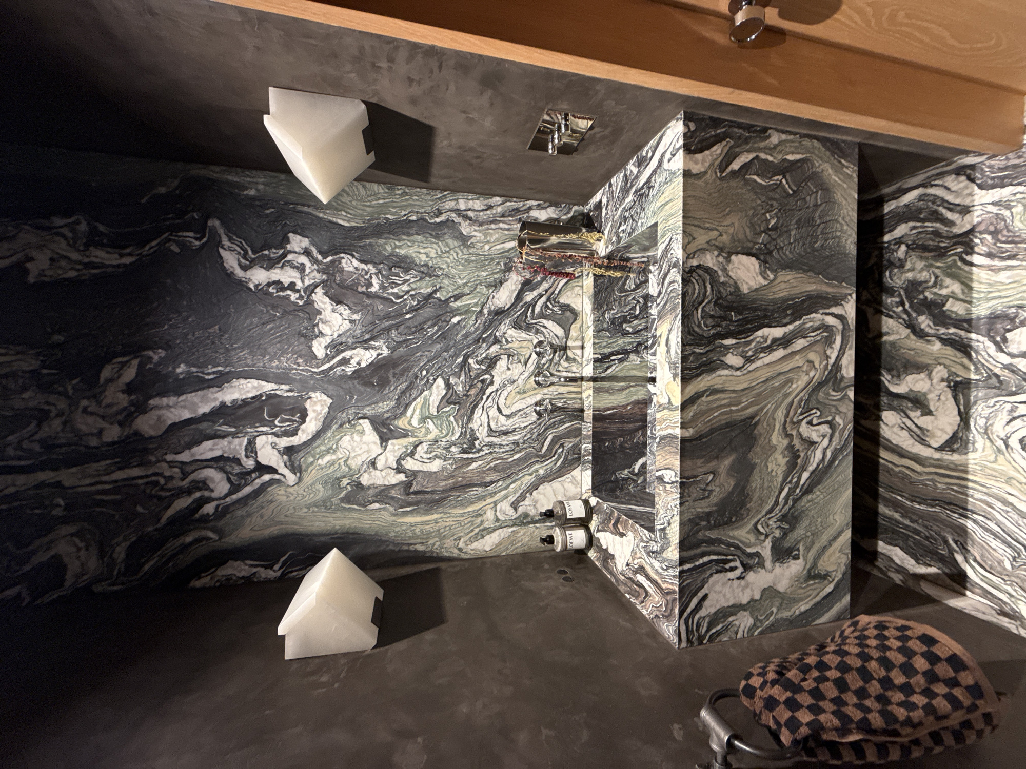 Interior home photos capture bathroom and books in LA