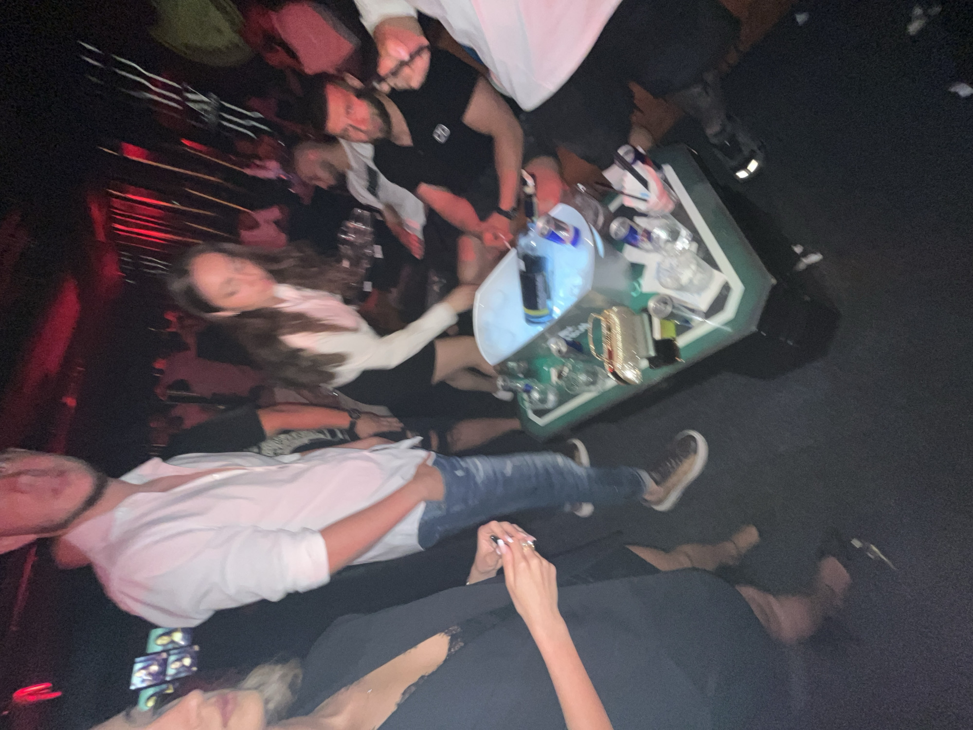 Social gathering documented at unidentified nightclub venue