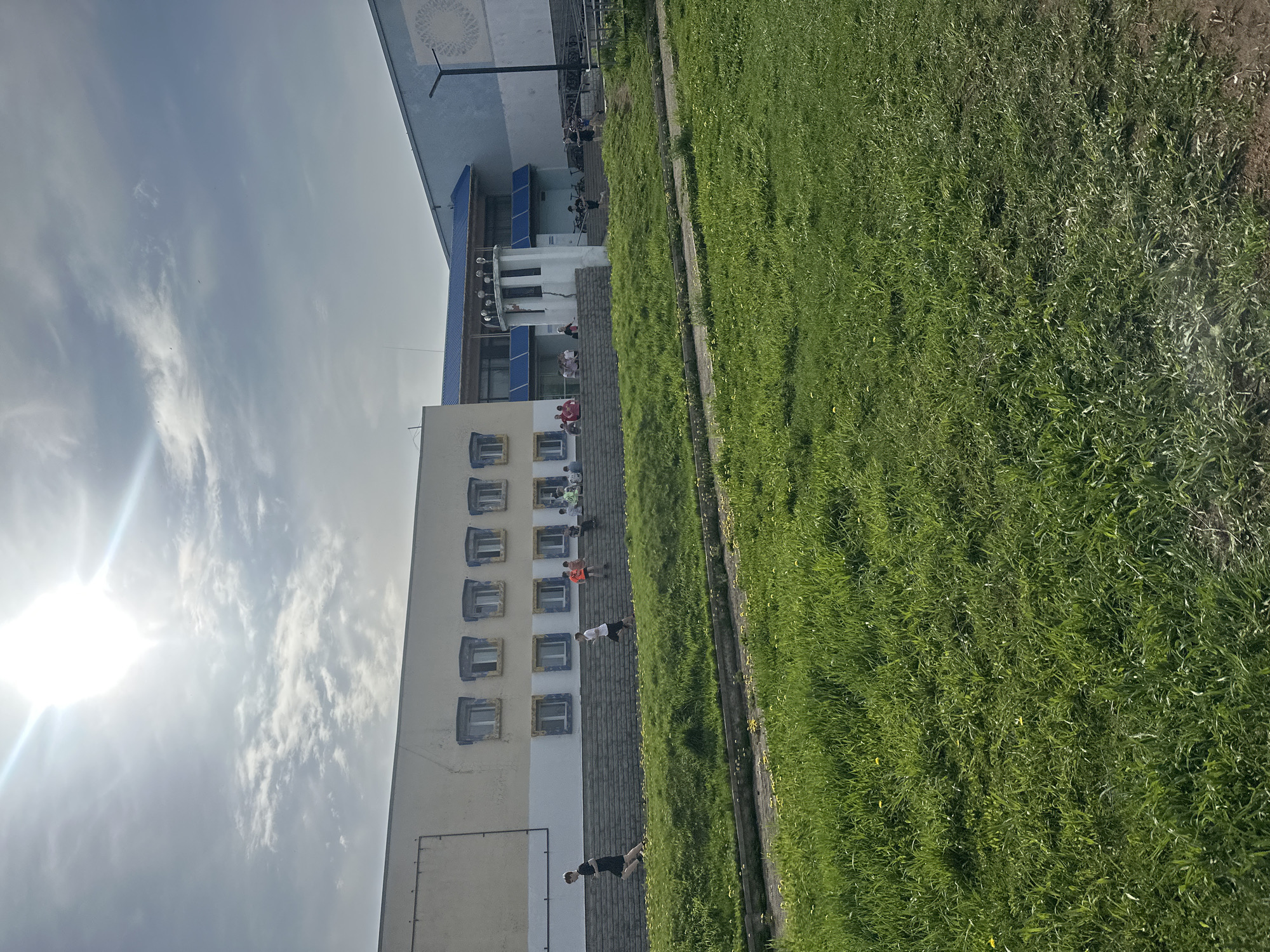 Woman takes selfies near building in Votkinsk, Russia