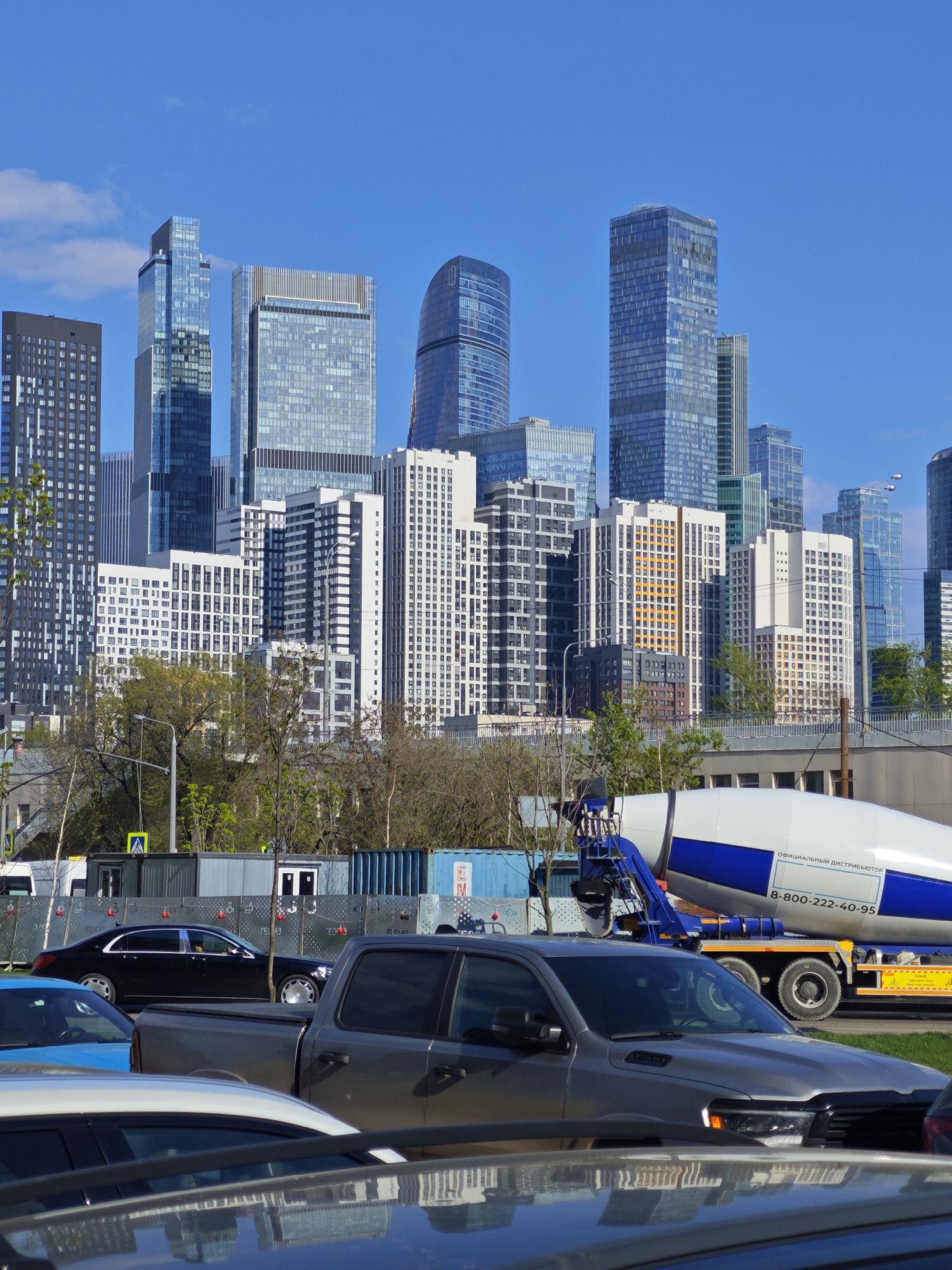 Concrete mixer truck spotted among parked vehicles in Moscow