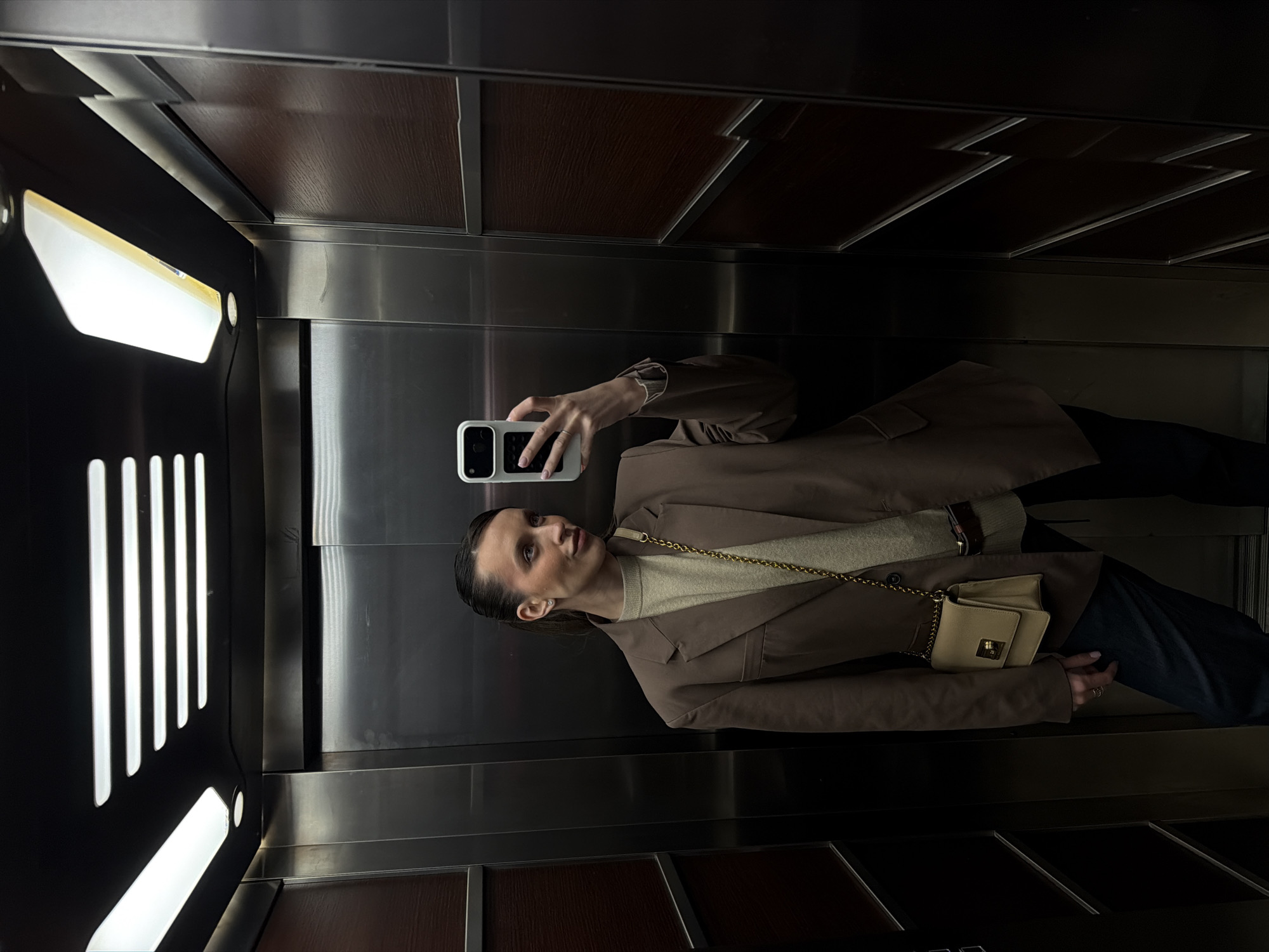Woman takes elevator selfie in Budva, Montenegro