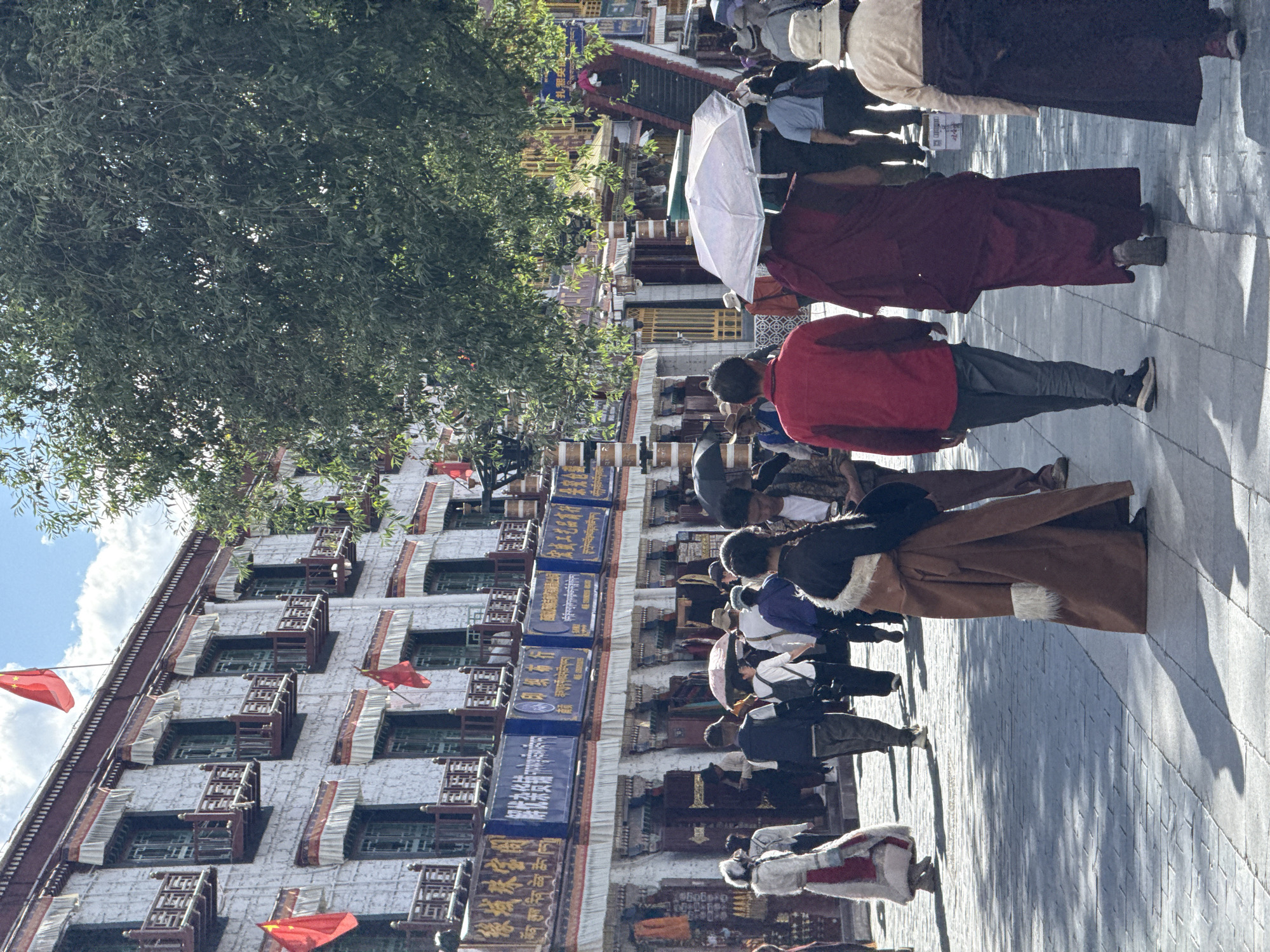 Busy Tibetan street scene documented in Chengguan District, China