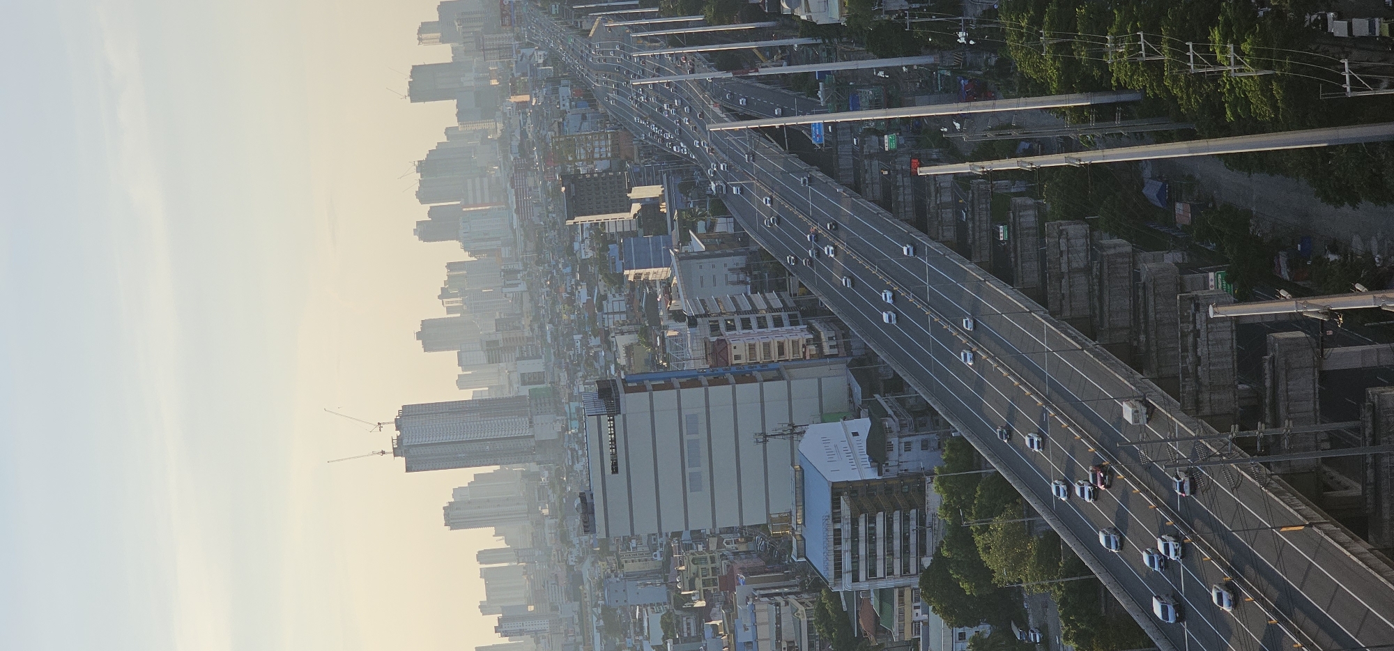 Makati's Skyway and skyline under a hazy morning glow