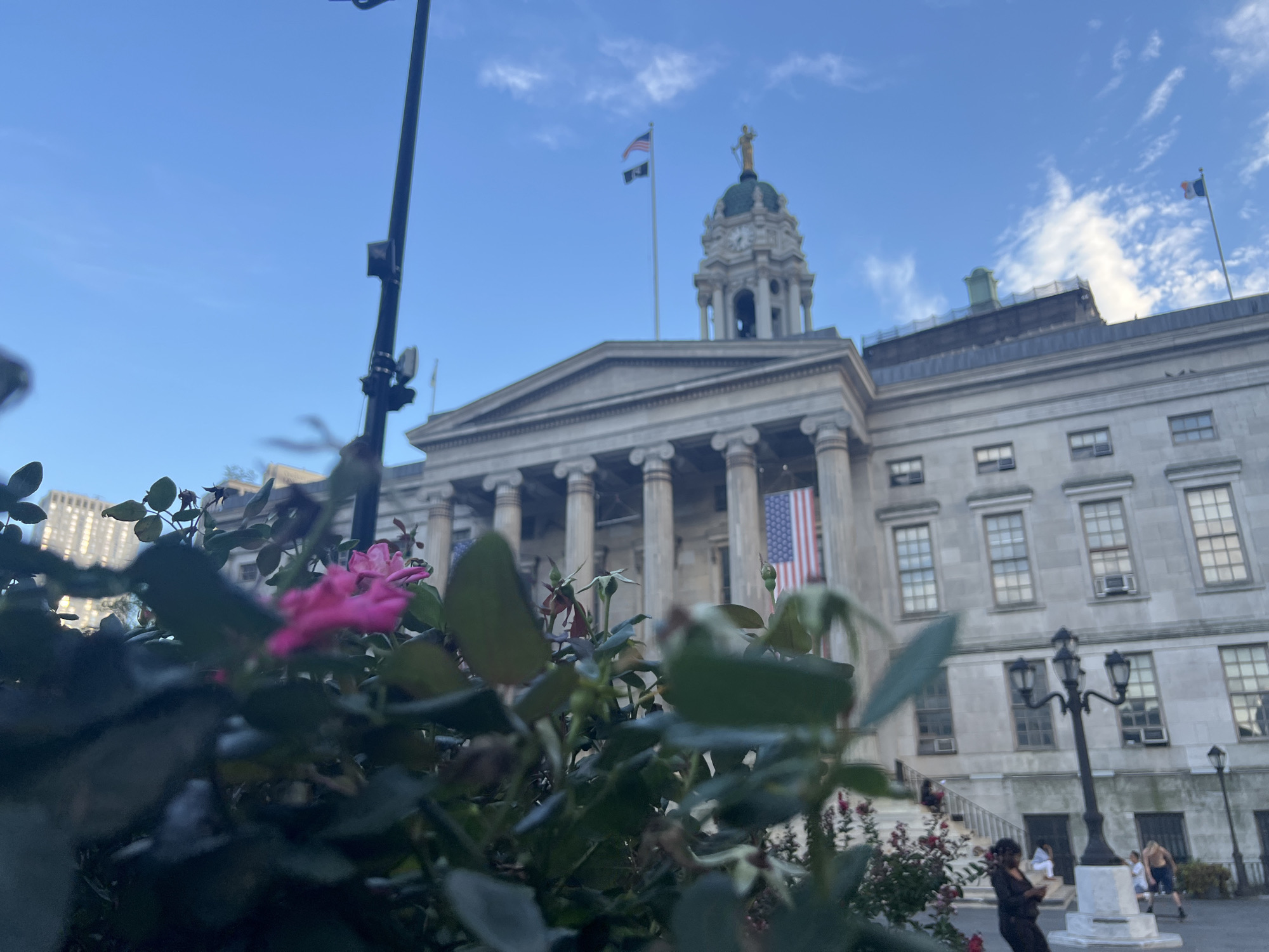 Multiple angles on Manhattan's Surrogate's Courthouse on a summer evening
