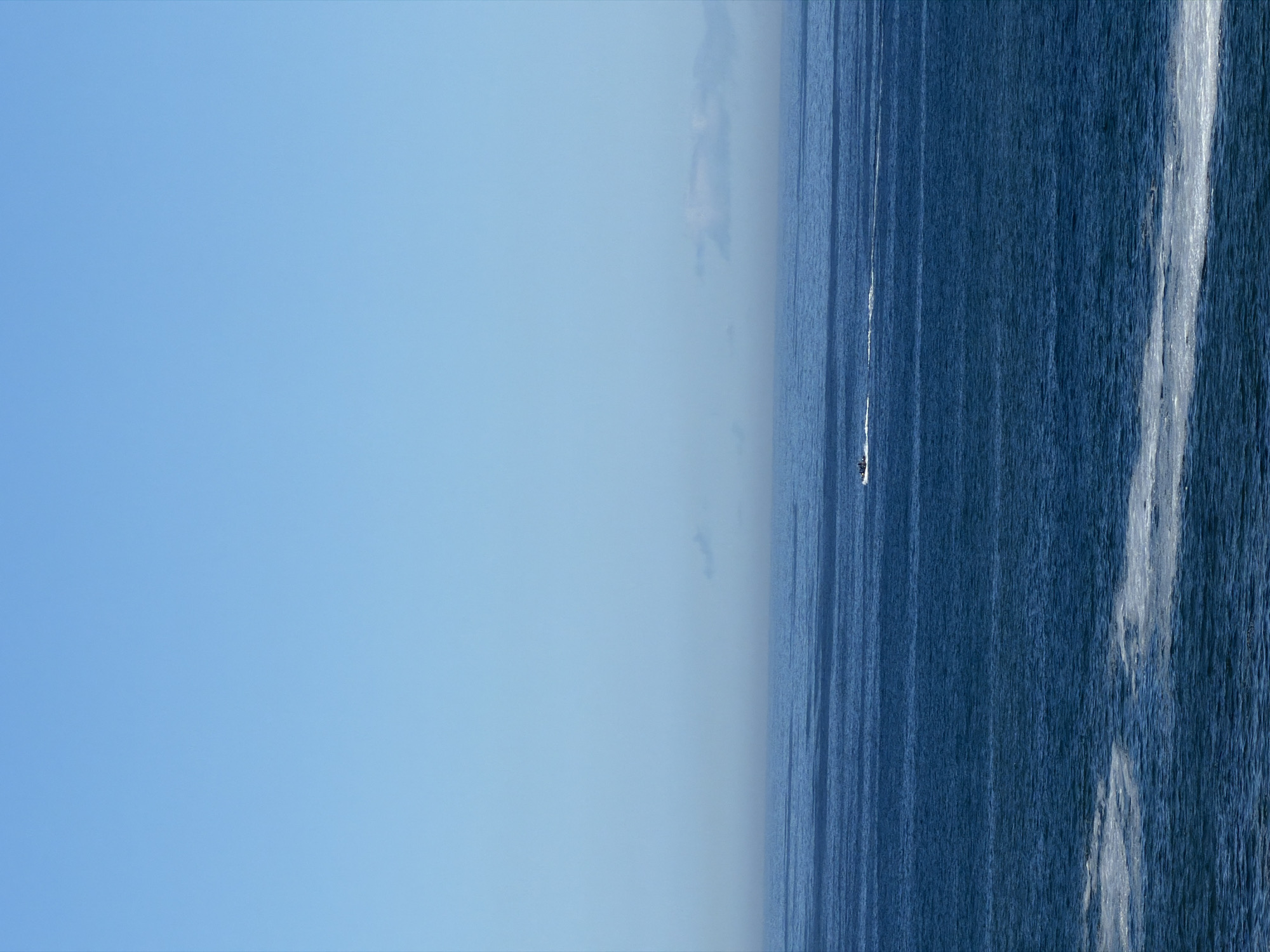 Uniformed group gathers on Cape Town pier overlooking ocean