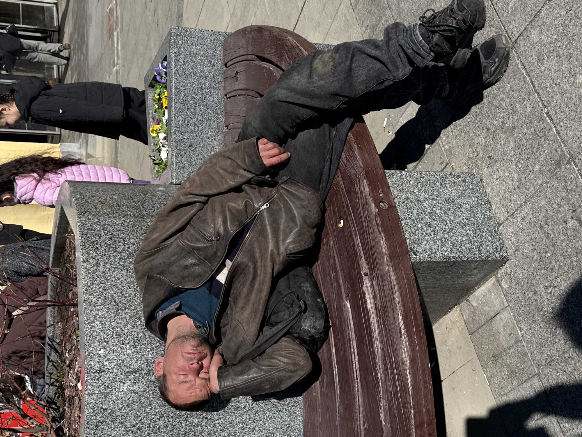 Casual urban moments captured around European city square