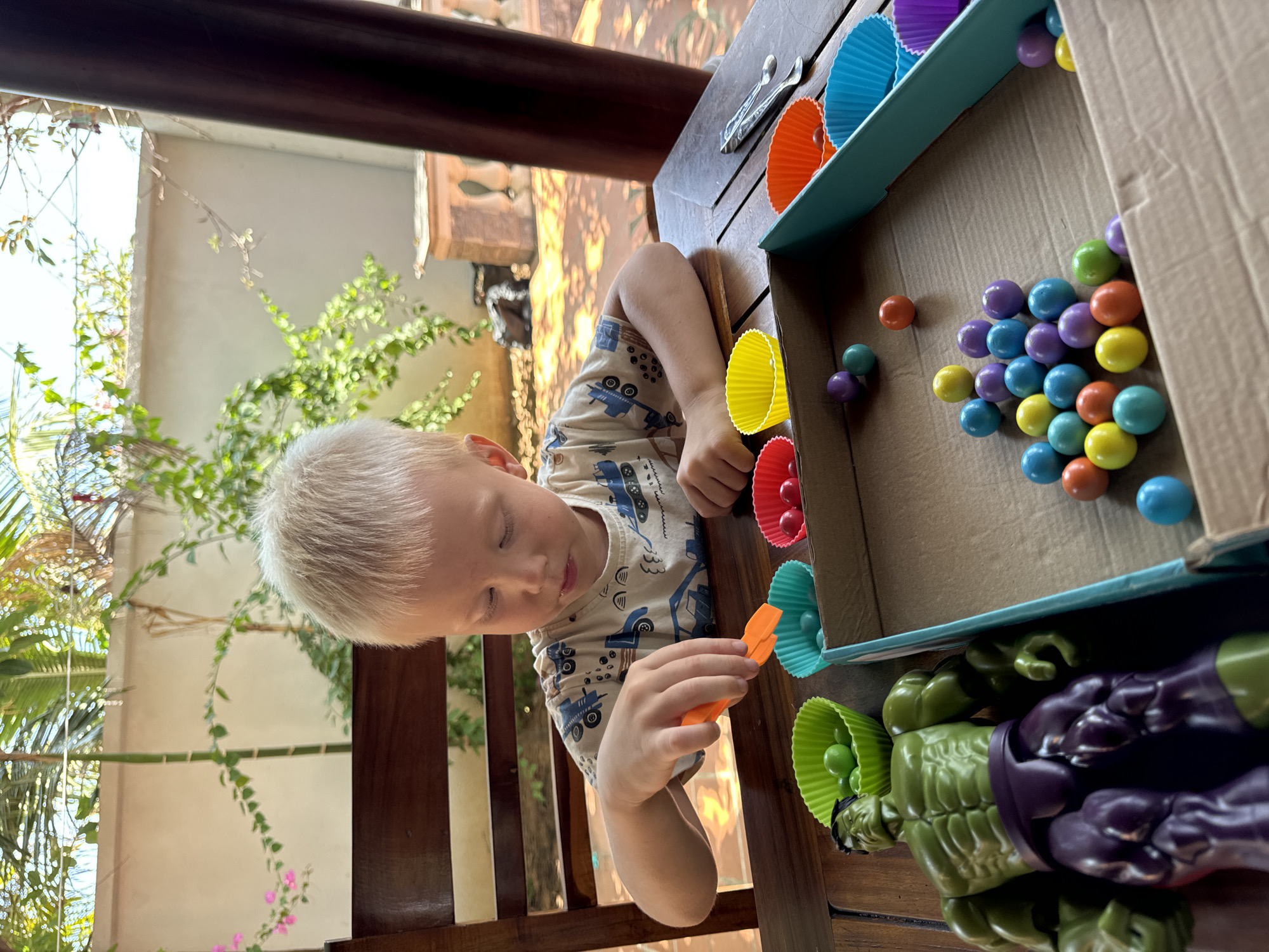 Child engages in educational play activity in Mũi Né