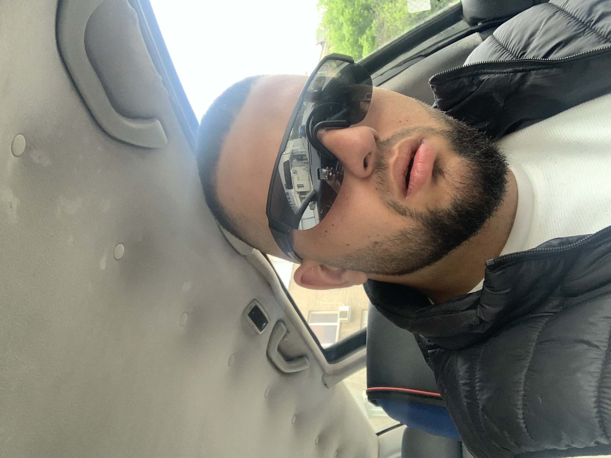 Young man photographed resting in vehicle in Gabrovo, Bulgaria