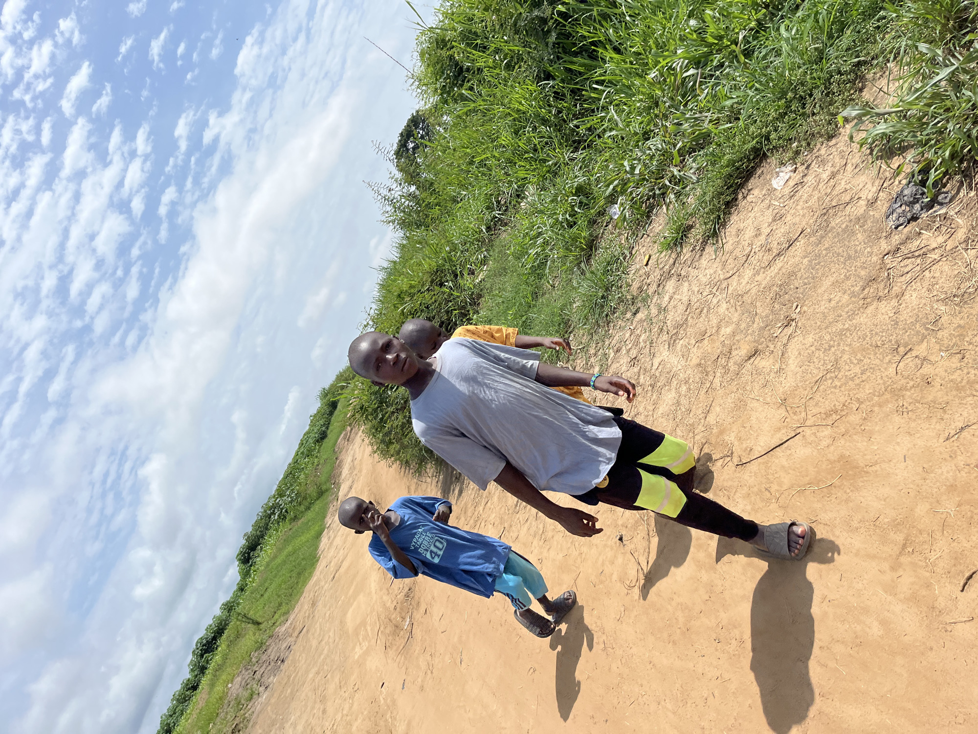 Daily life unfolds on dirt roads in Idah, Nigeria