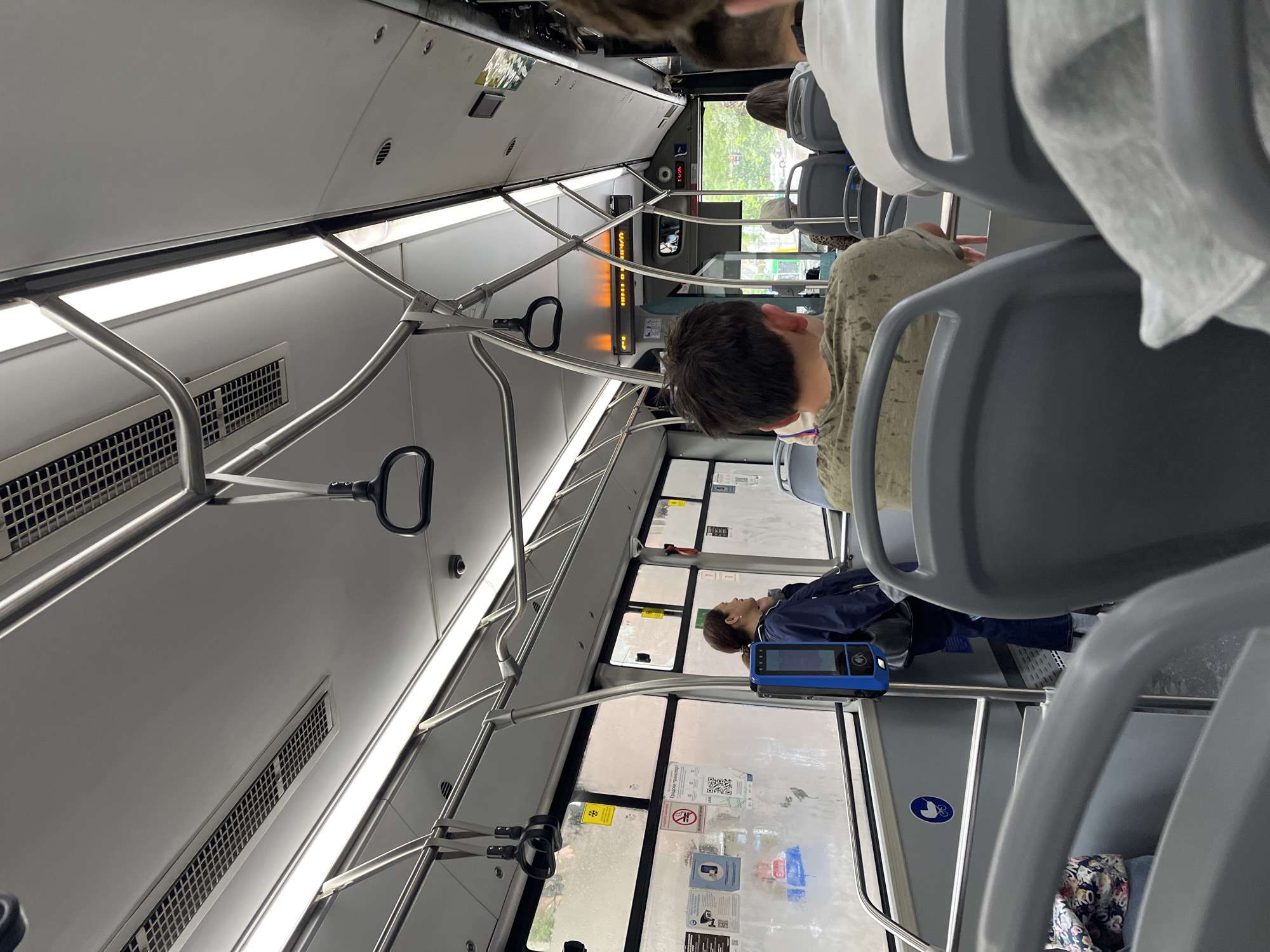 Passenger documents modern bus interior in Sofia