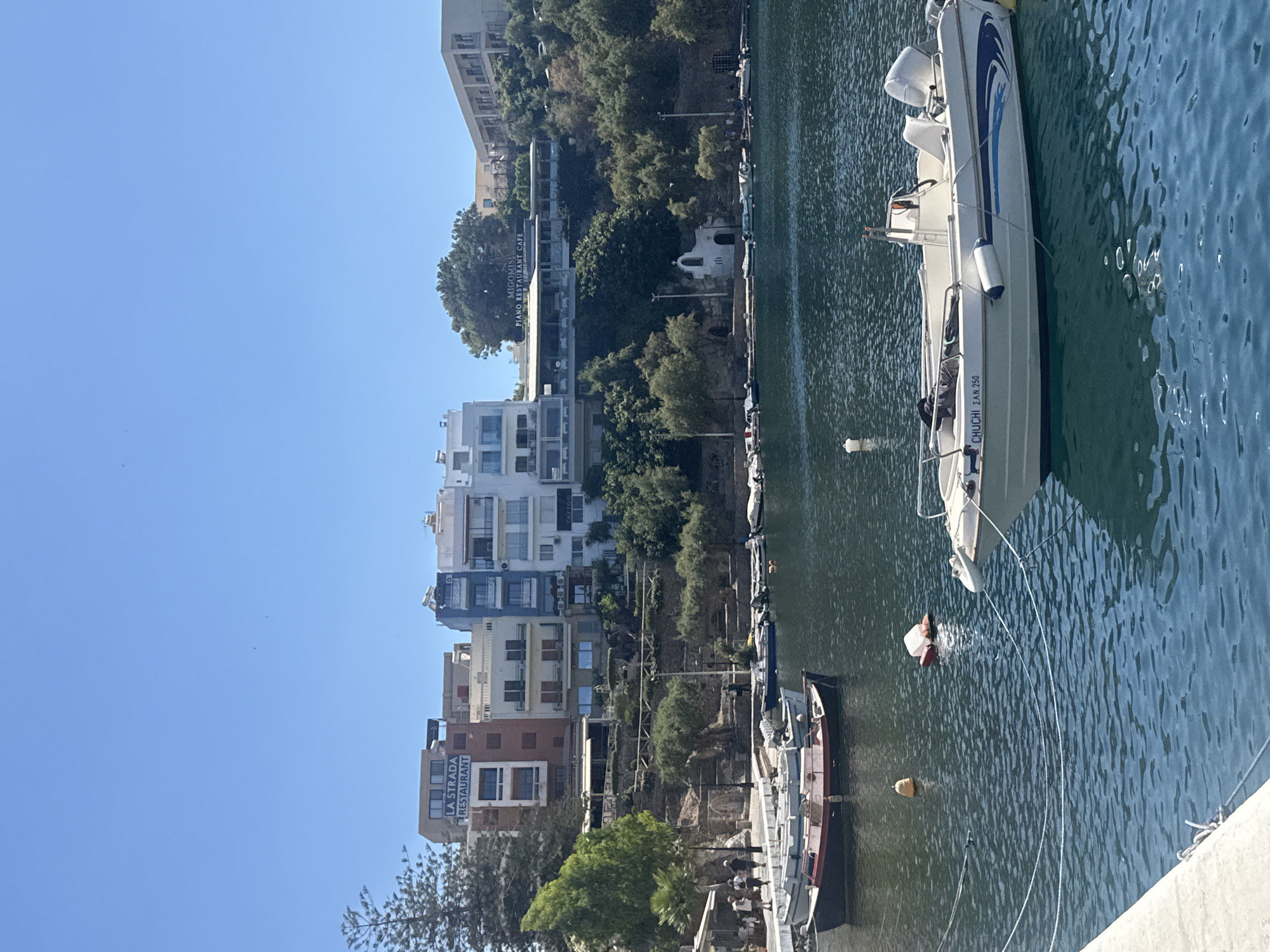 Exploring Agios Nikolaos harbor and town on a sunny afternoon