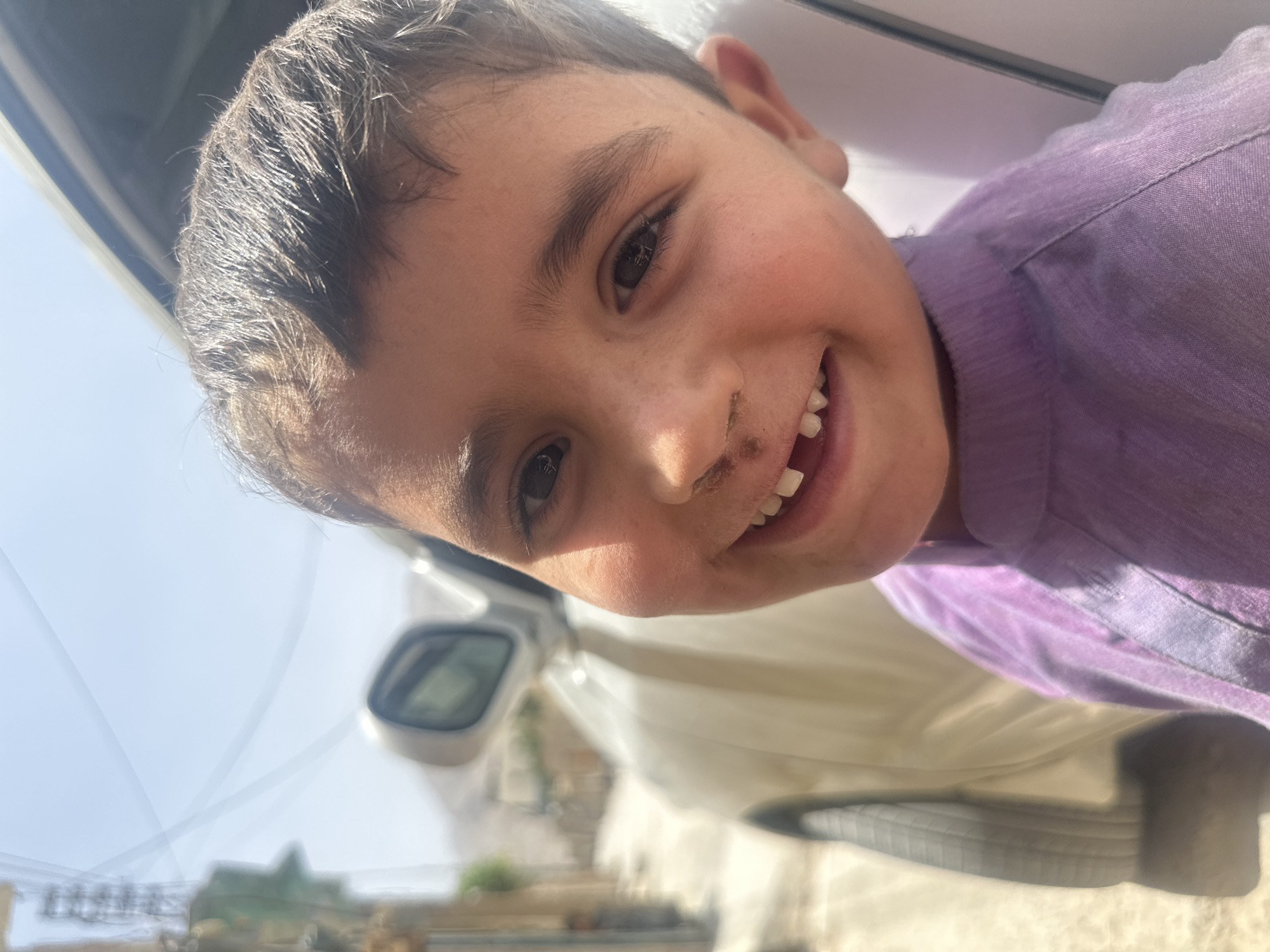 Big smile, missing tooth — a portrait from Quetta, Pakistan