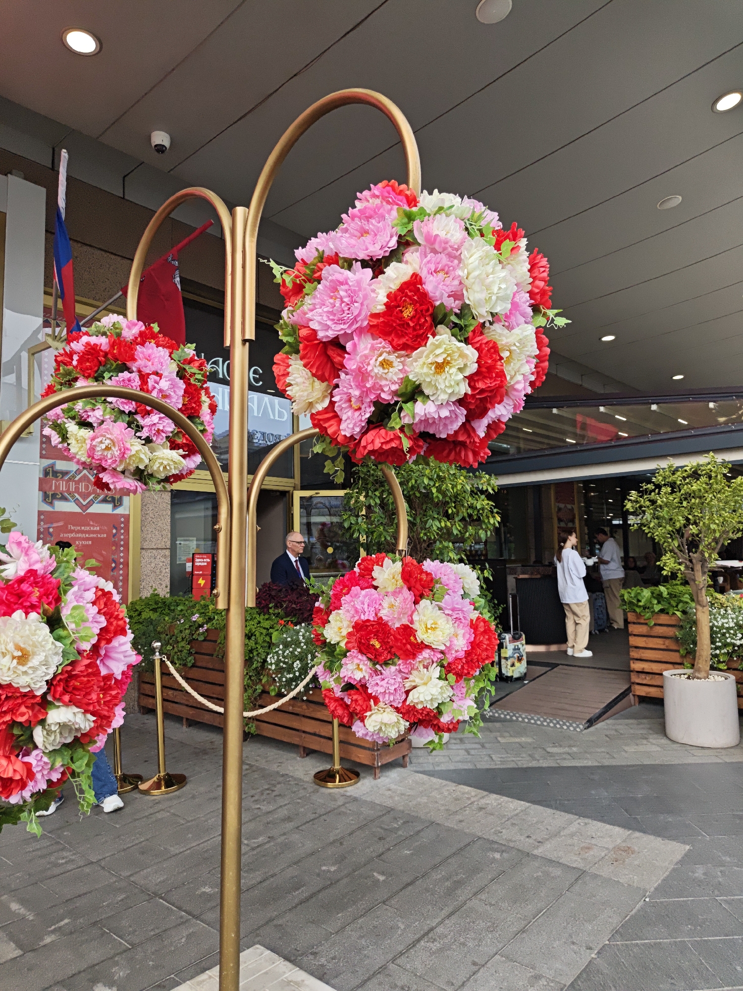 Floral displays and live performance outside Kievskaya complex, Moscow