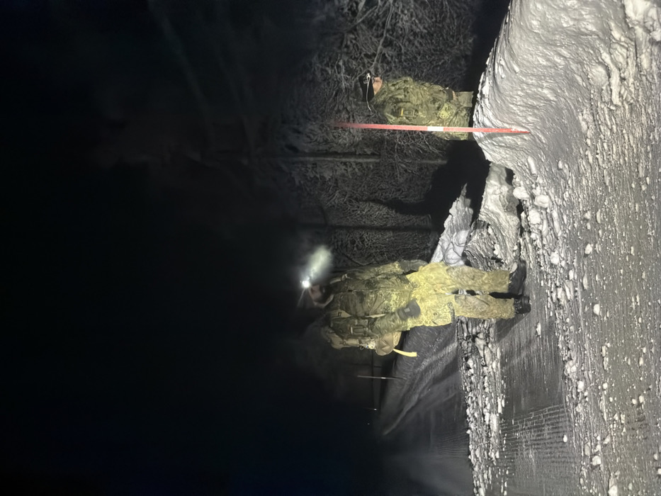 Vehicle overturns in snowy Norway, soldiers respond during aurora