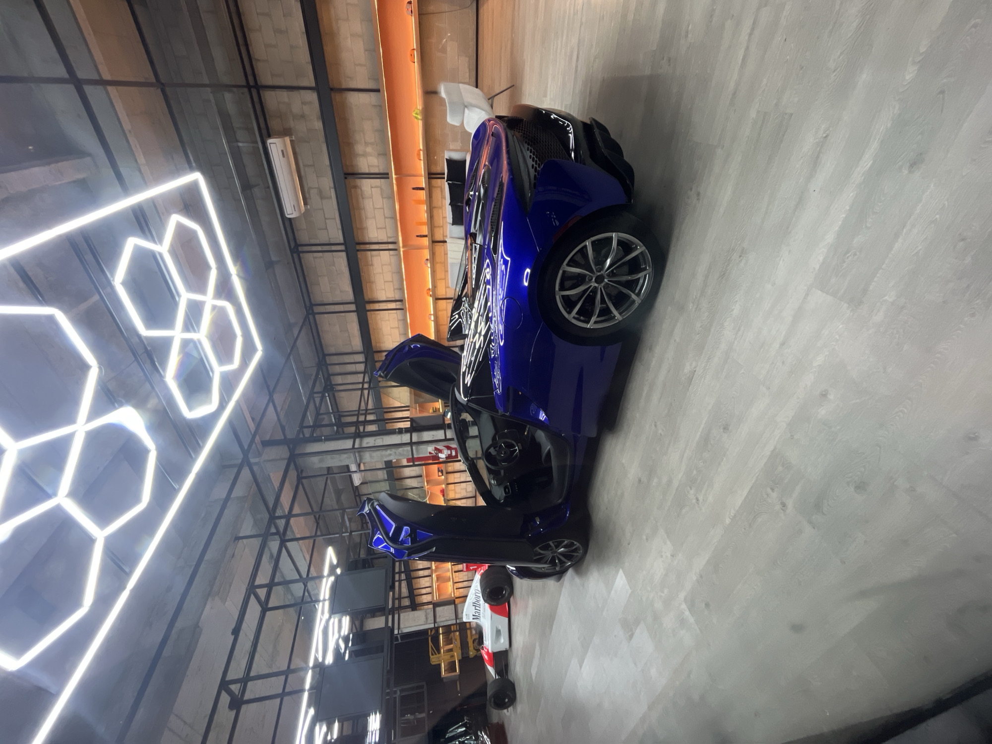 Luxury car collection displayed at Buenos Aires showroom