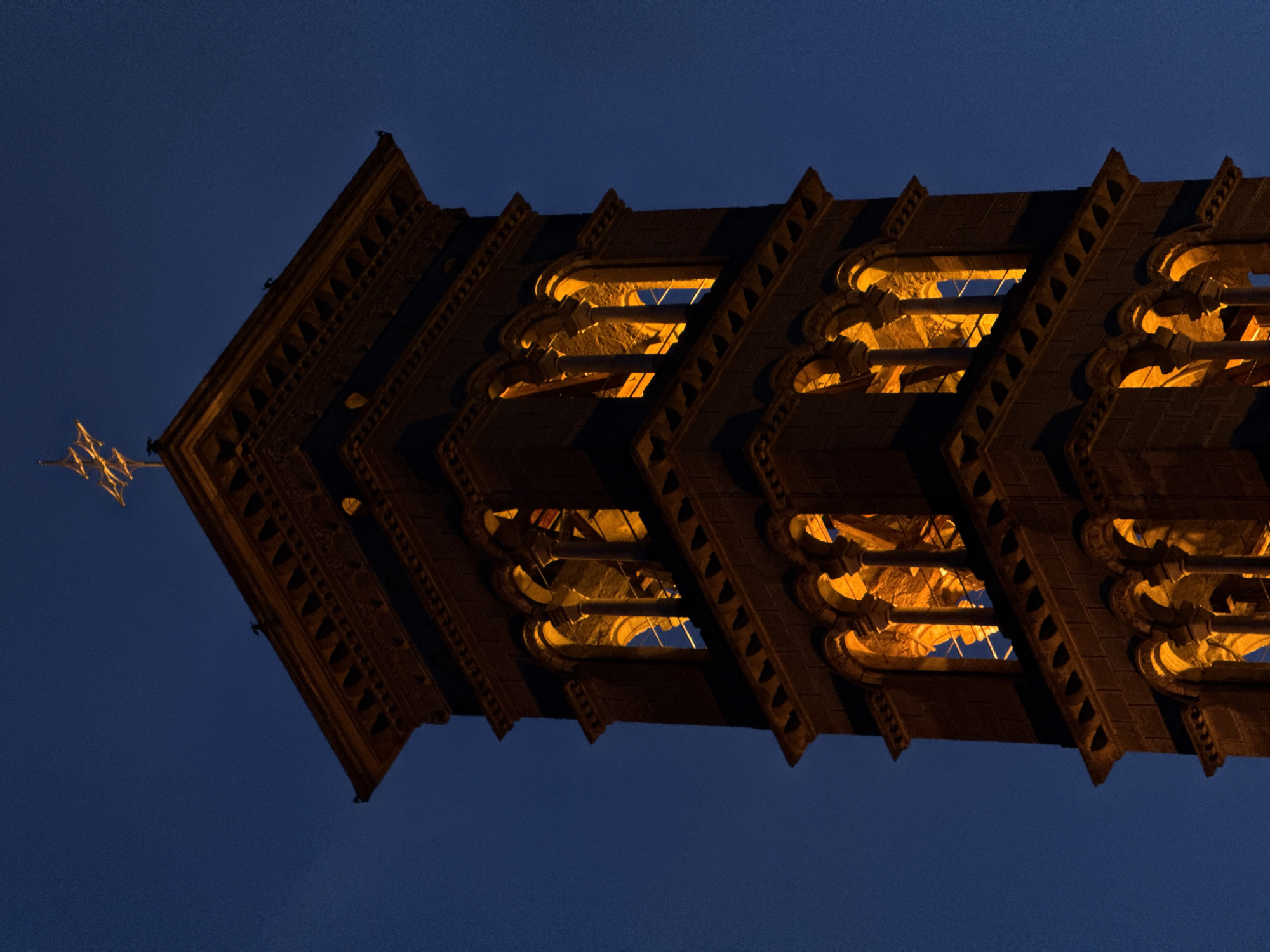 Historic stone tower photographed at twilight in St. Moritz
