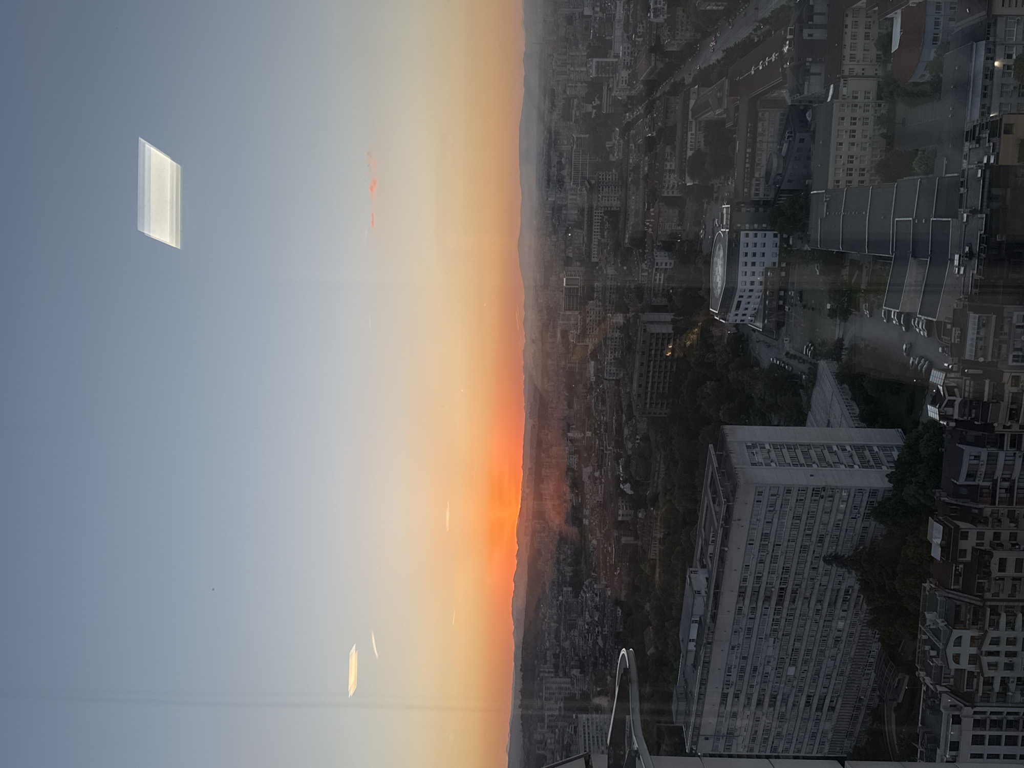 Sofia sunset viewed from high-rise buildings across city
