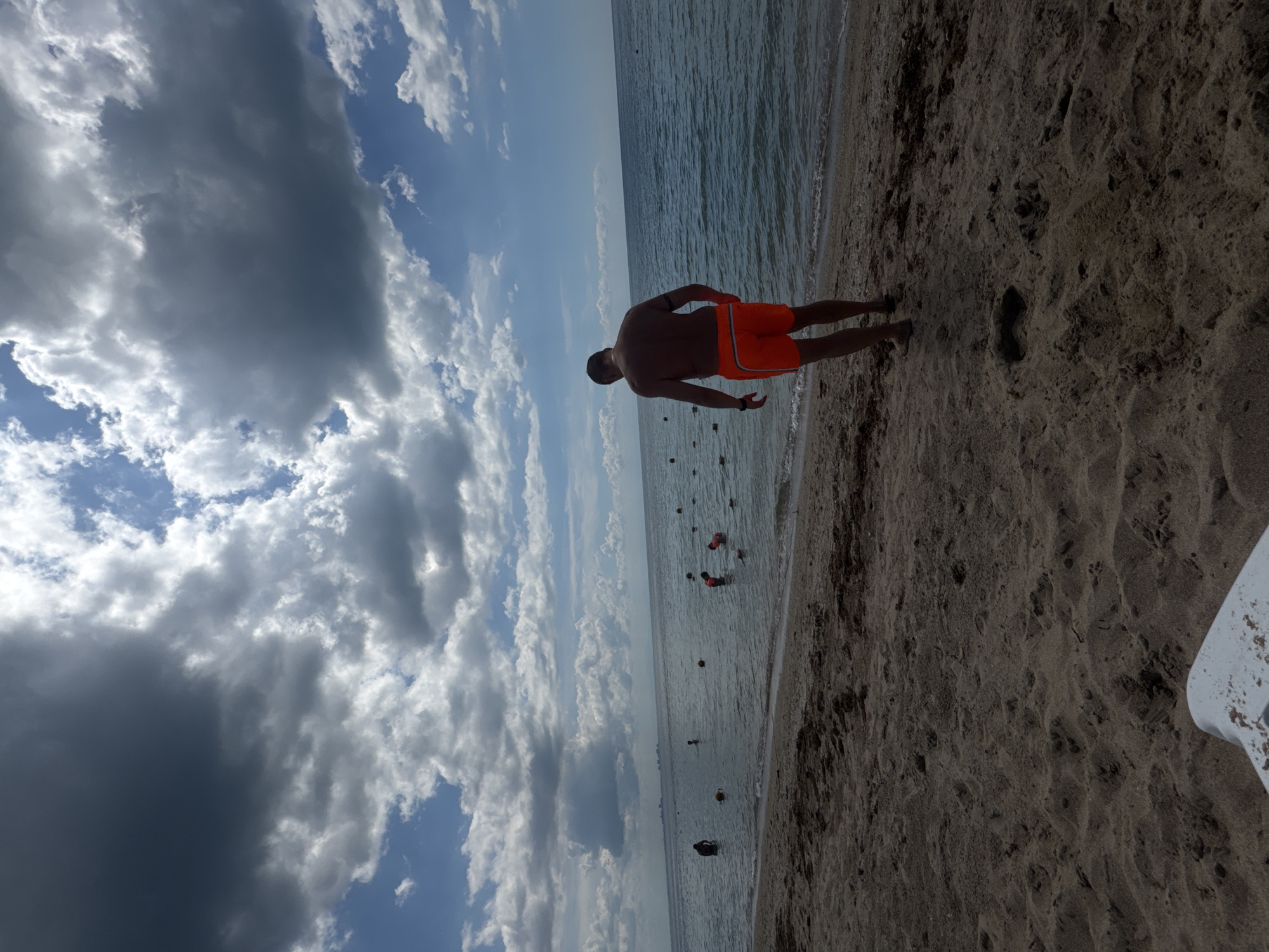 Family enjoys morning beach outing in Yevpatoriya, Ukraine