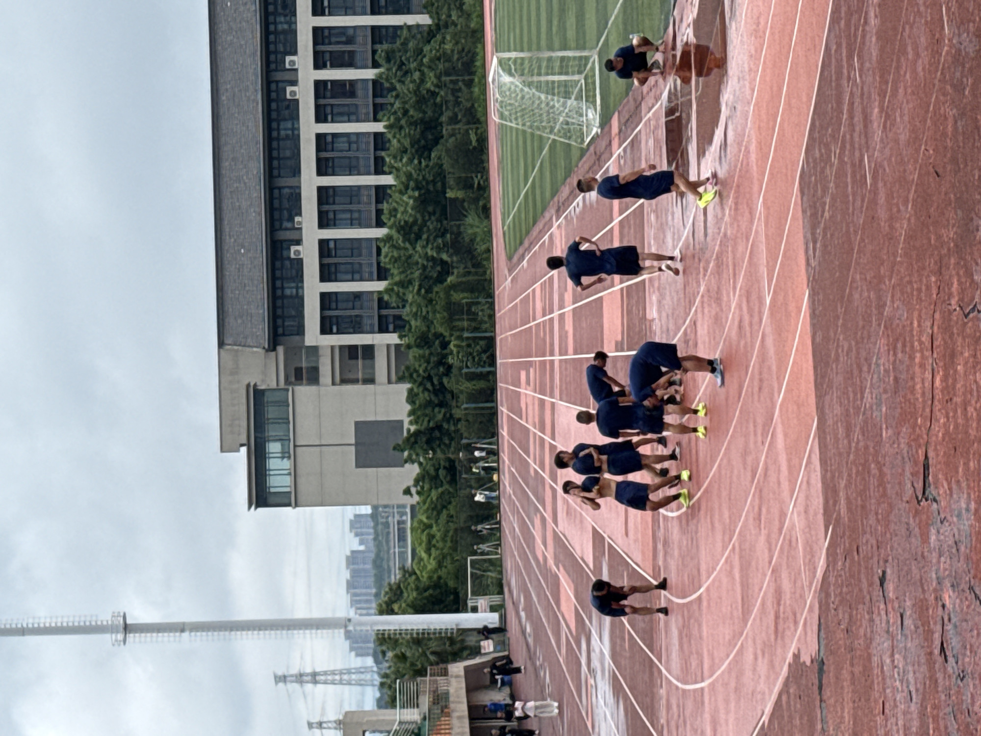 Surveying and track training underway at Jiangjin District Stadium