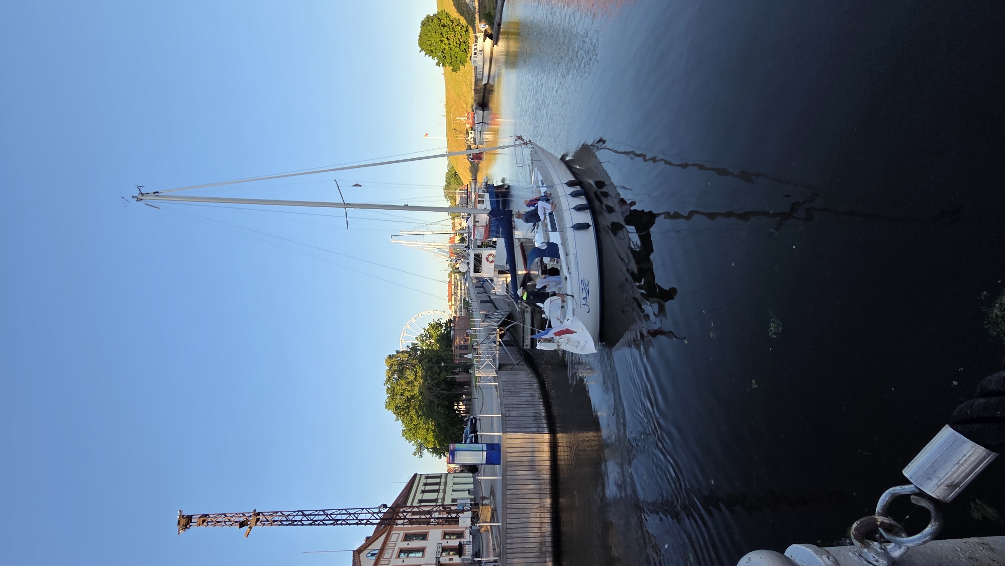 Klaipėda waterfront: marina, drawbridge, and street sculpture