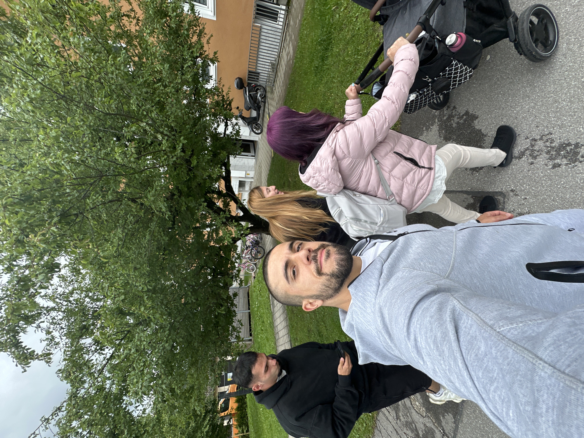 Tourist snapshots document cloudy day in Bavarian Alpine town