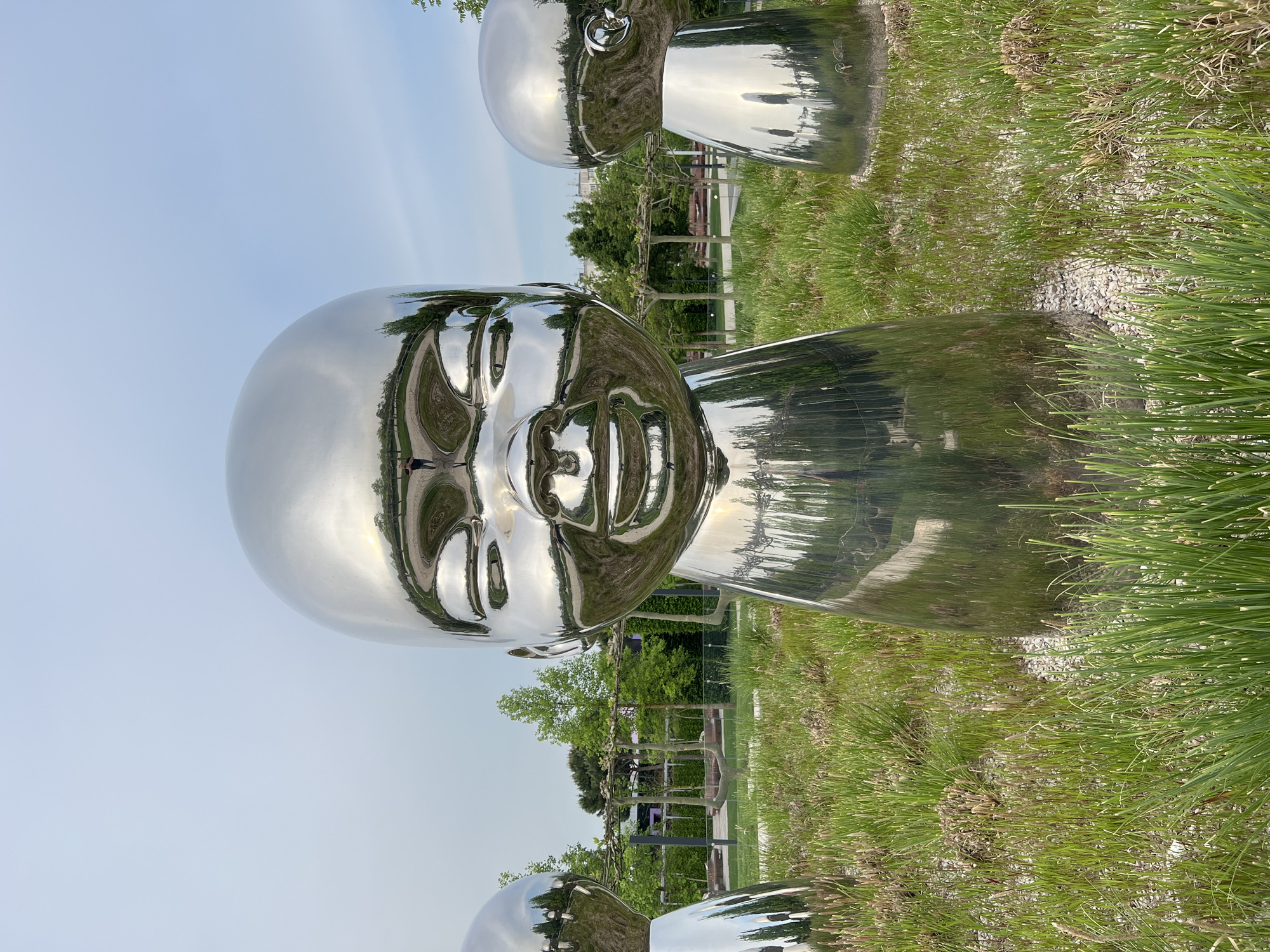 Metallic baby sculpture installation documented in Krasnodar park