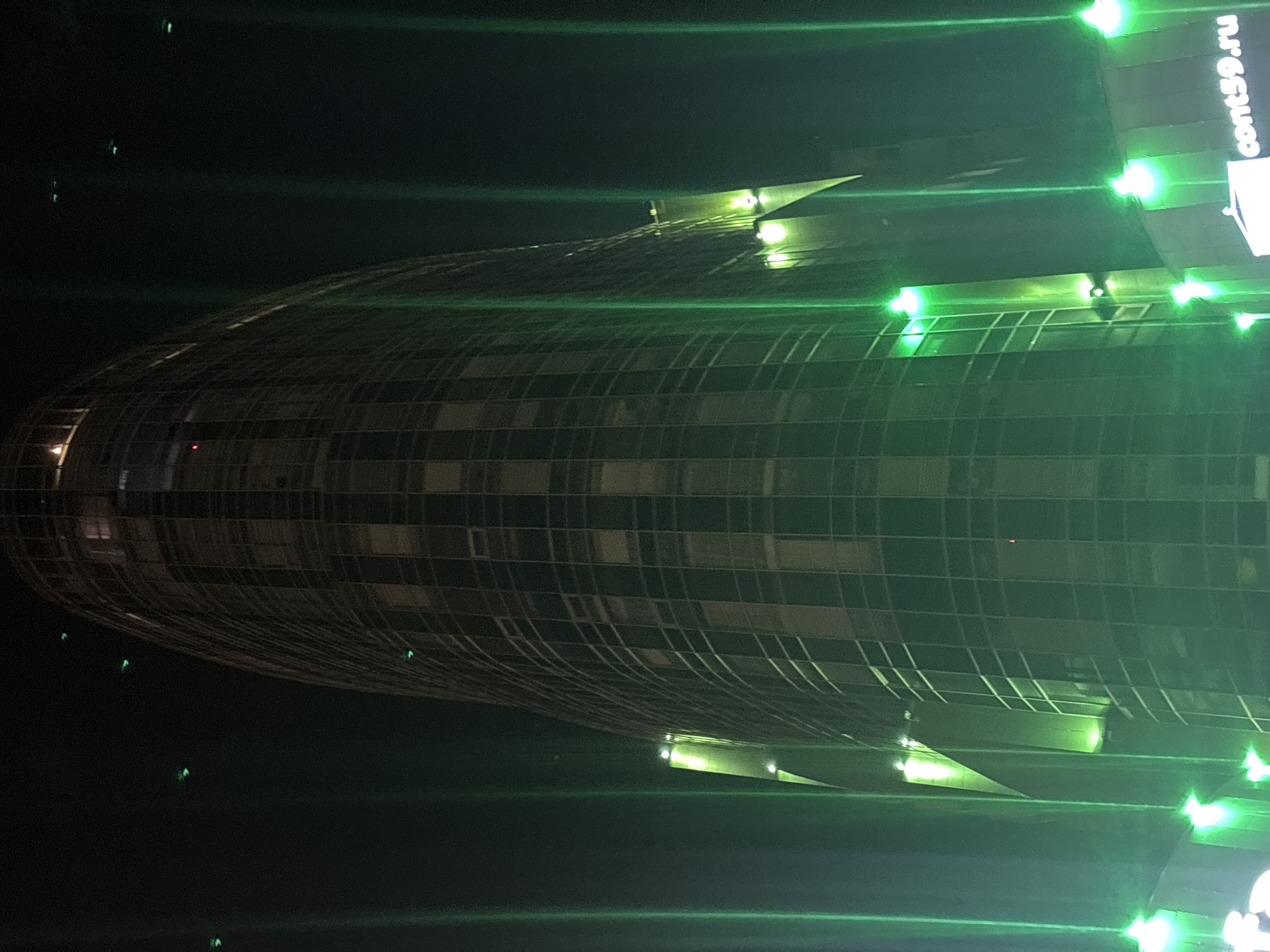 Night views of illuminated Green Plaza business center in Perm