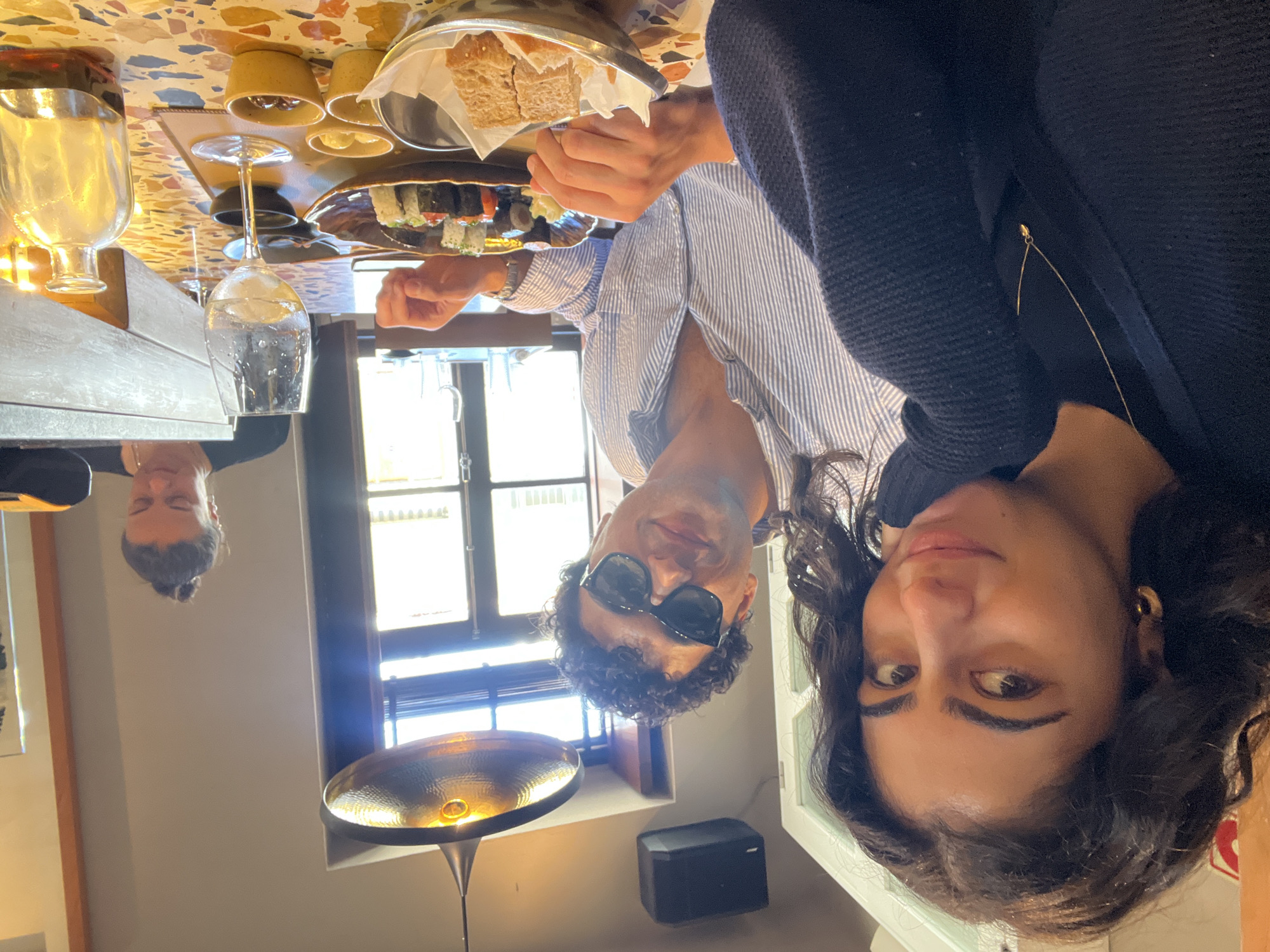 Diners photograph food at Porto restaurant during lunch