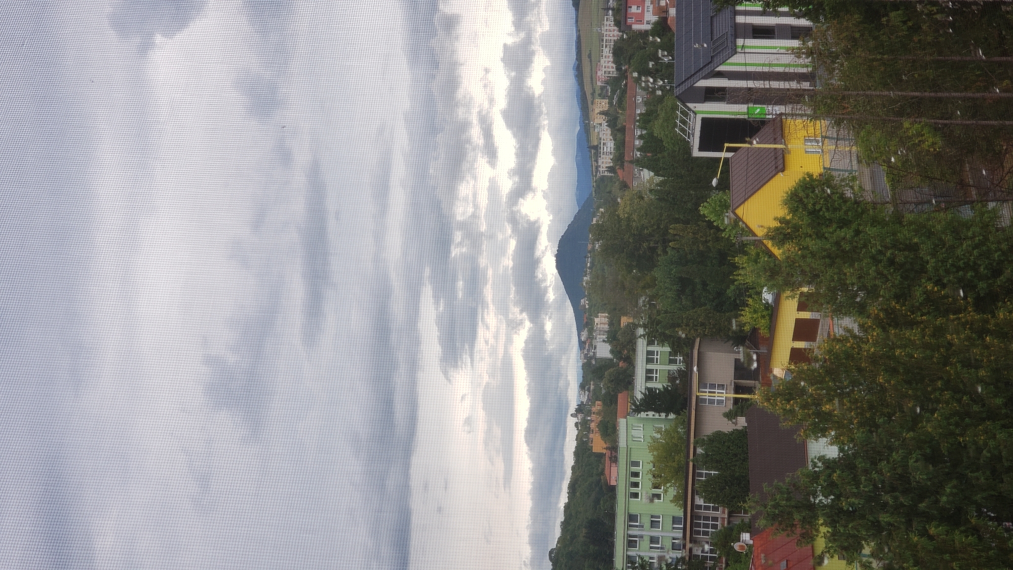 Rainy-day views across Prešov from above, August 2026