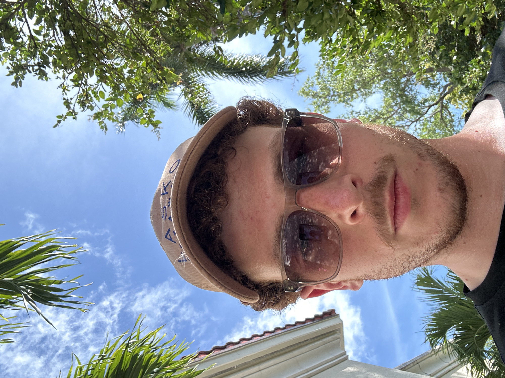 Man takes selfie in Aventura driveway area