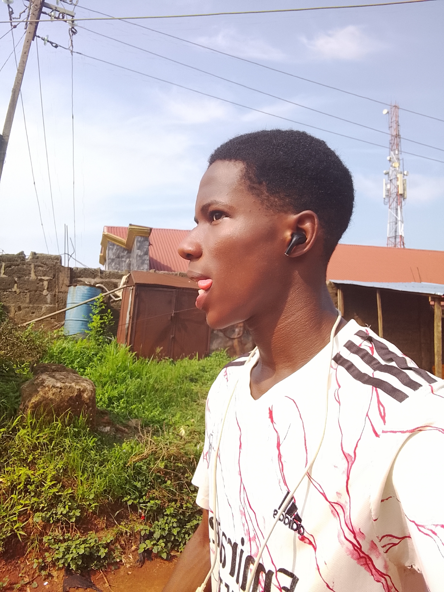 Young men documented on dirt roads in Nigeria communities