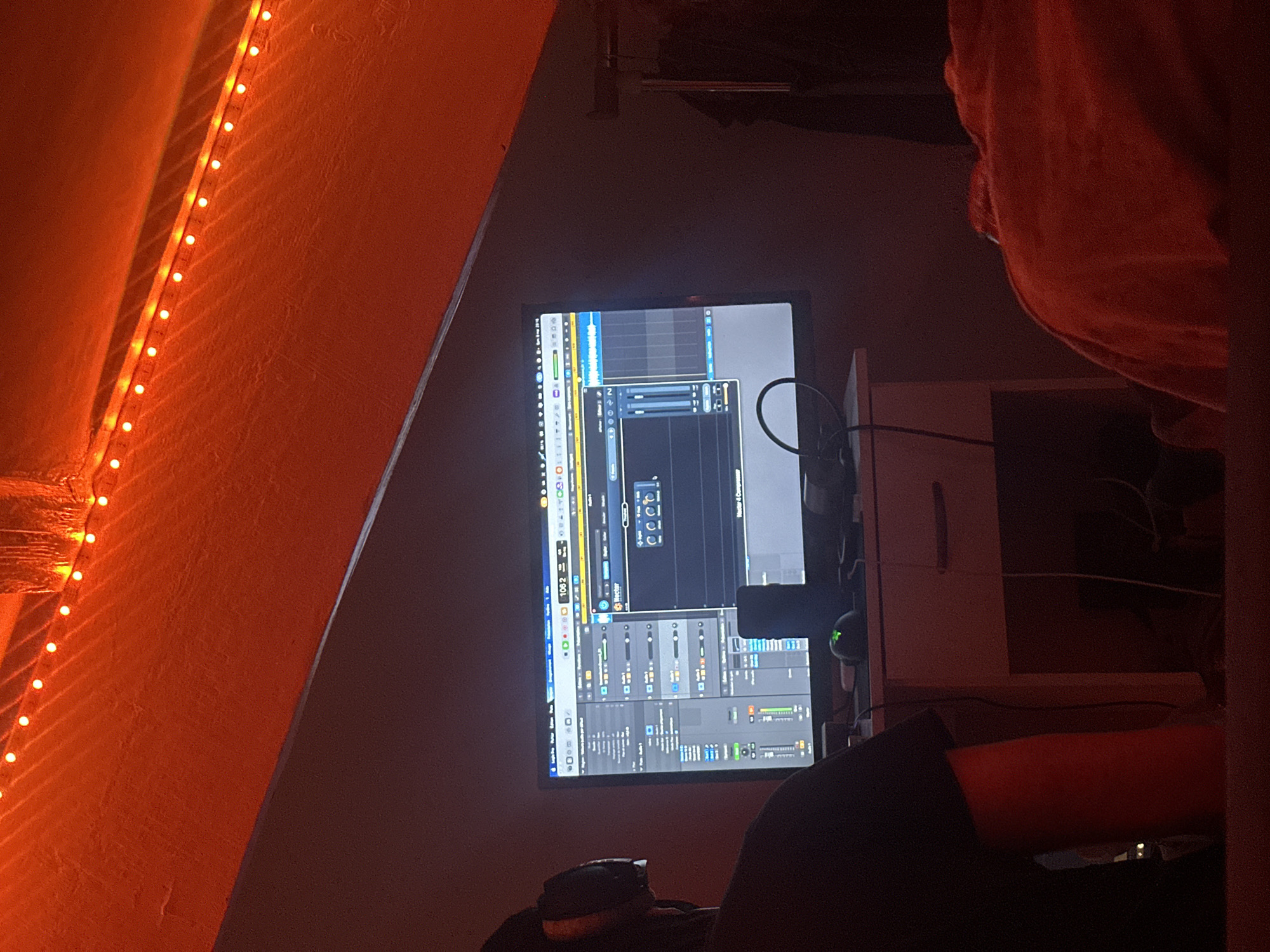 Music producer works late night session in Paris studio