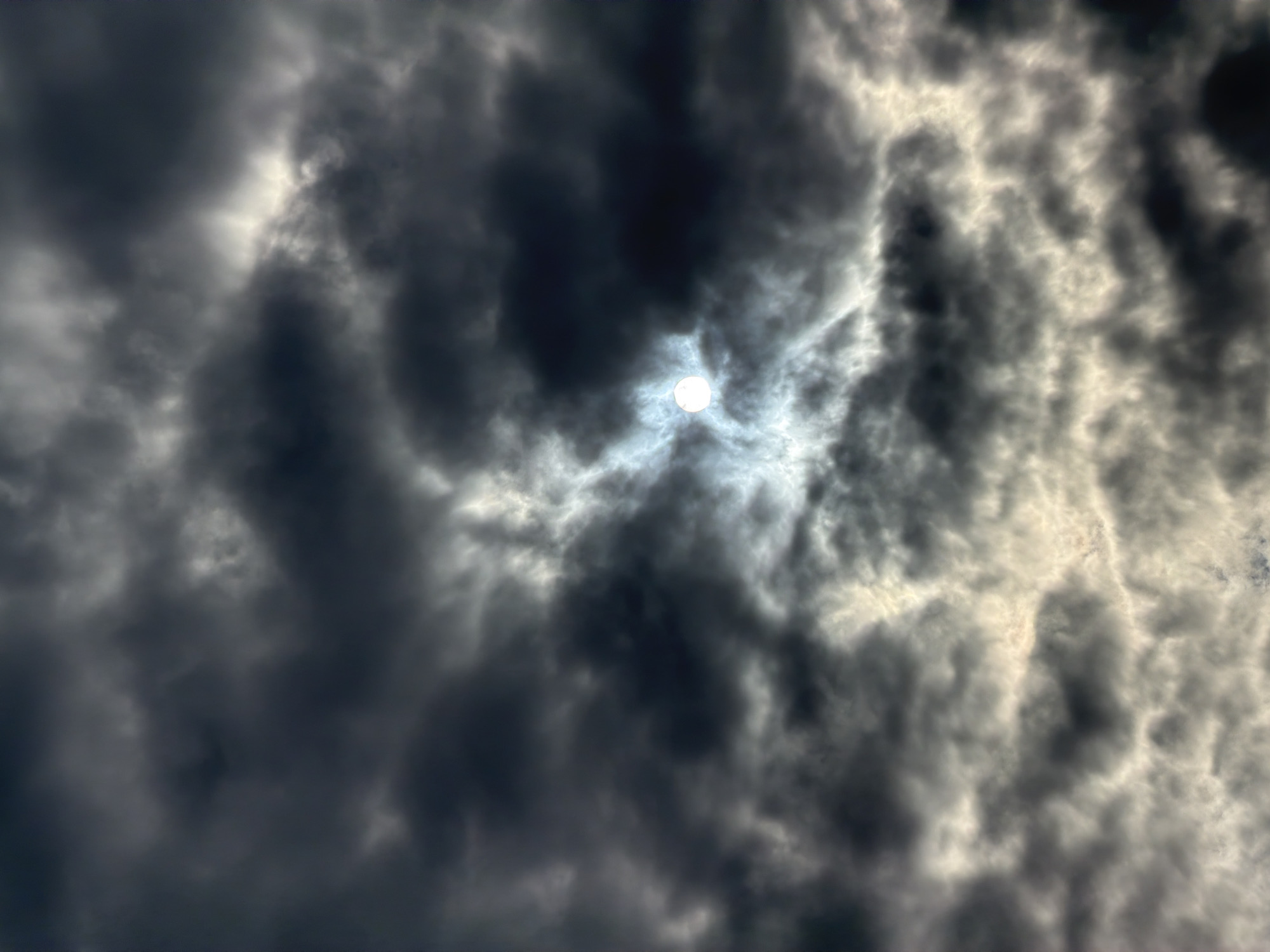 Dark clouds with sunbreaks observed over Riga, Latvia