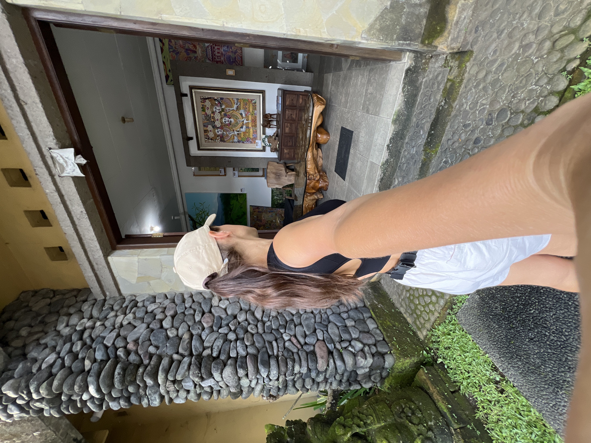 Woman explores Ubud markets and streets in early morning