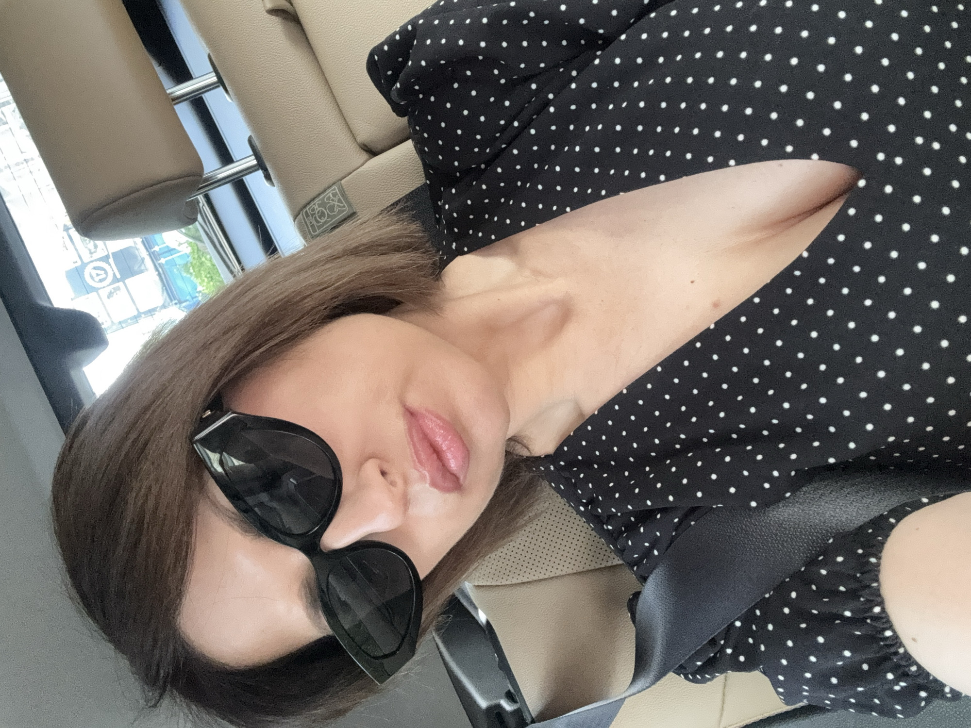 Woman takes early morning car selfies in Sofia