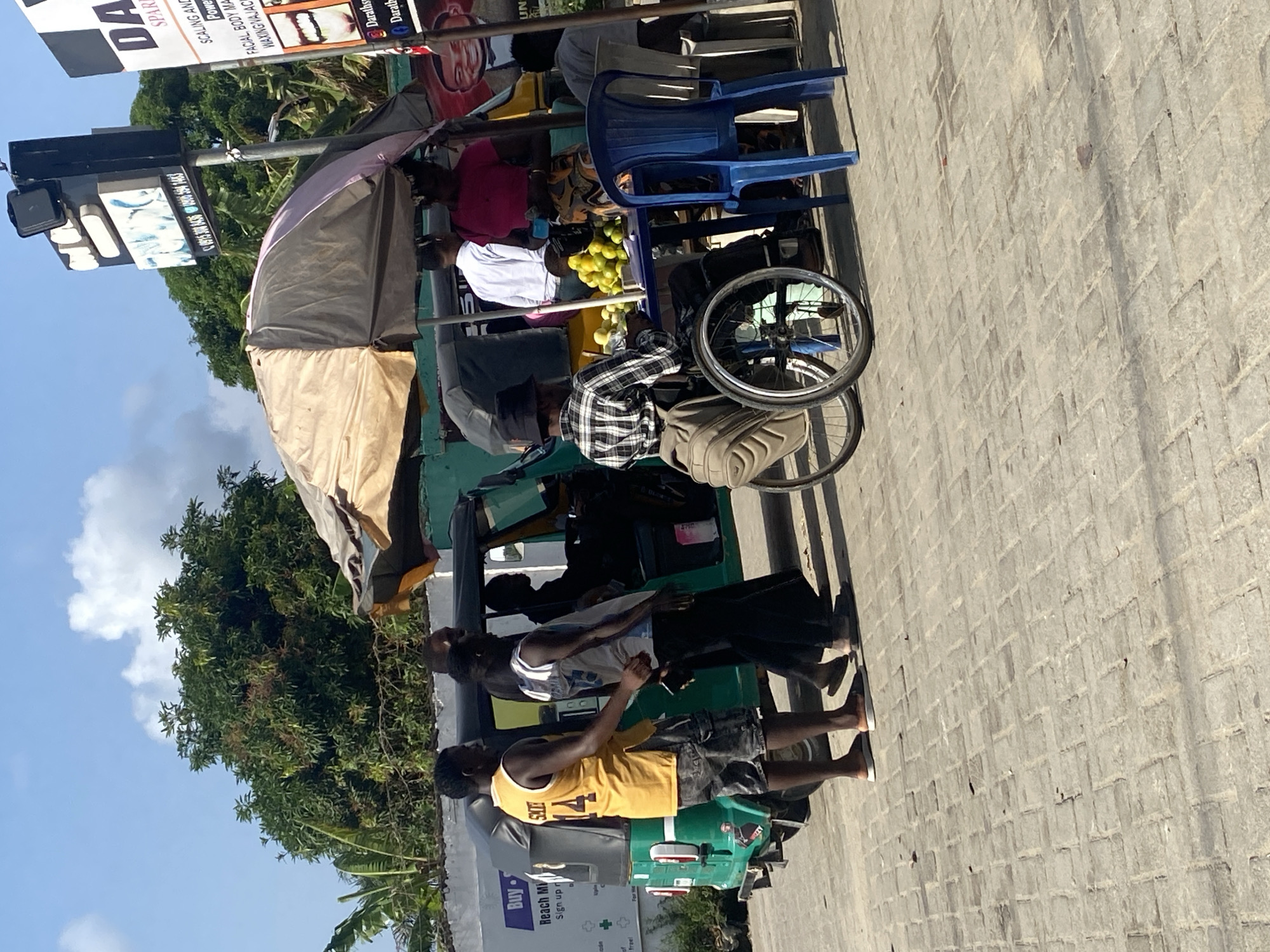 Street vendors operate mobile businesses in Ado, Nigeria