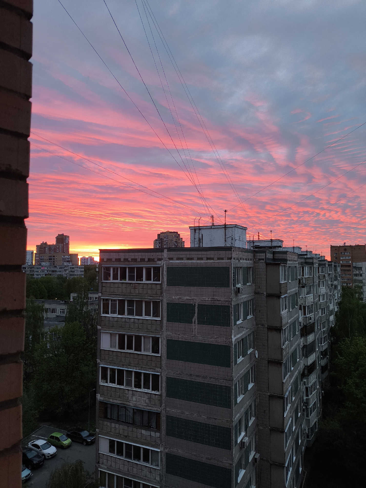Dramatic red sunset illuminates Khimki cityscape