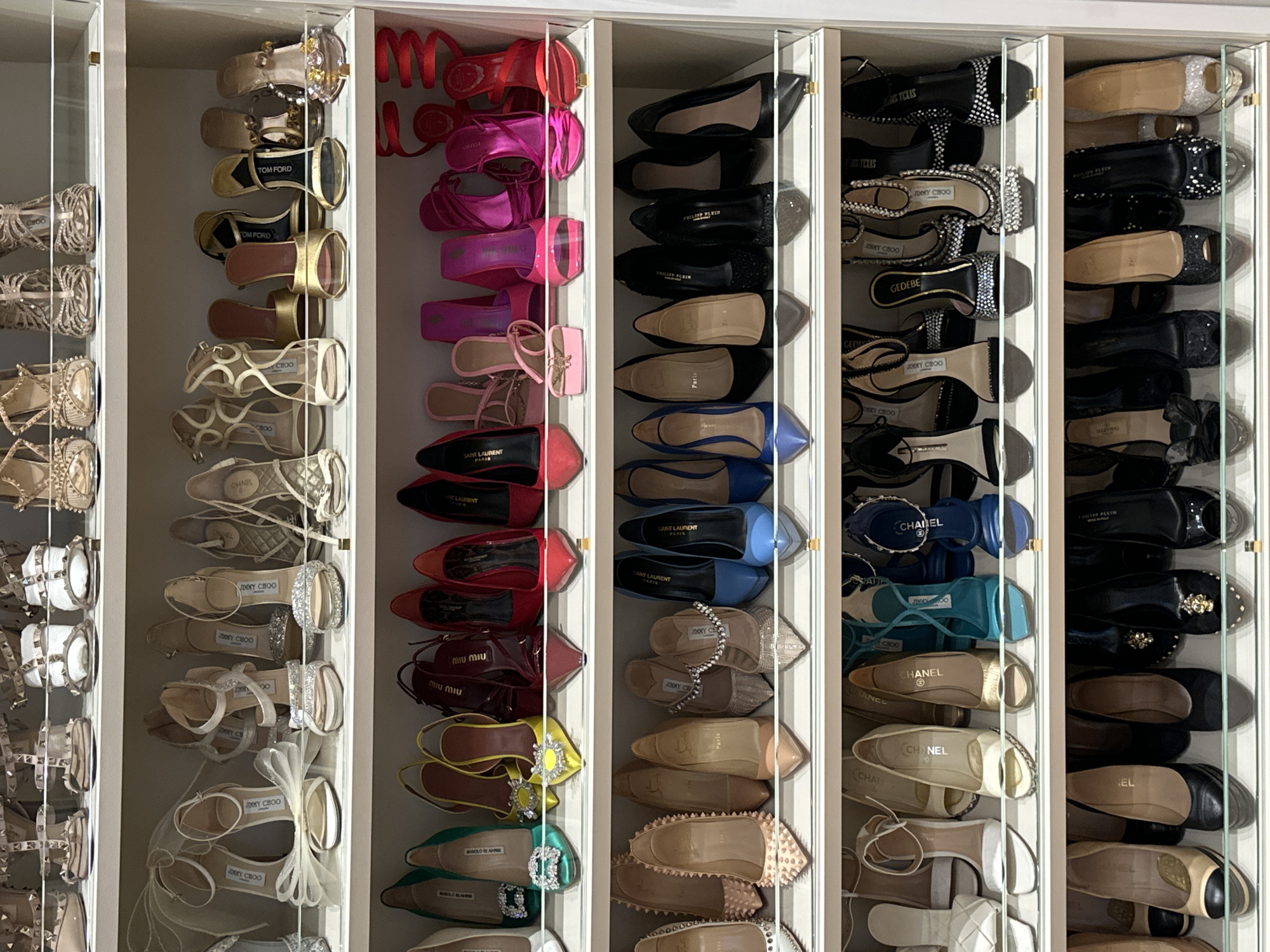 Moscow resident's organized luxury shoe collection documented